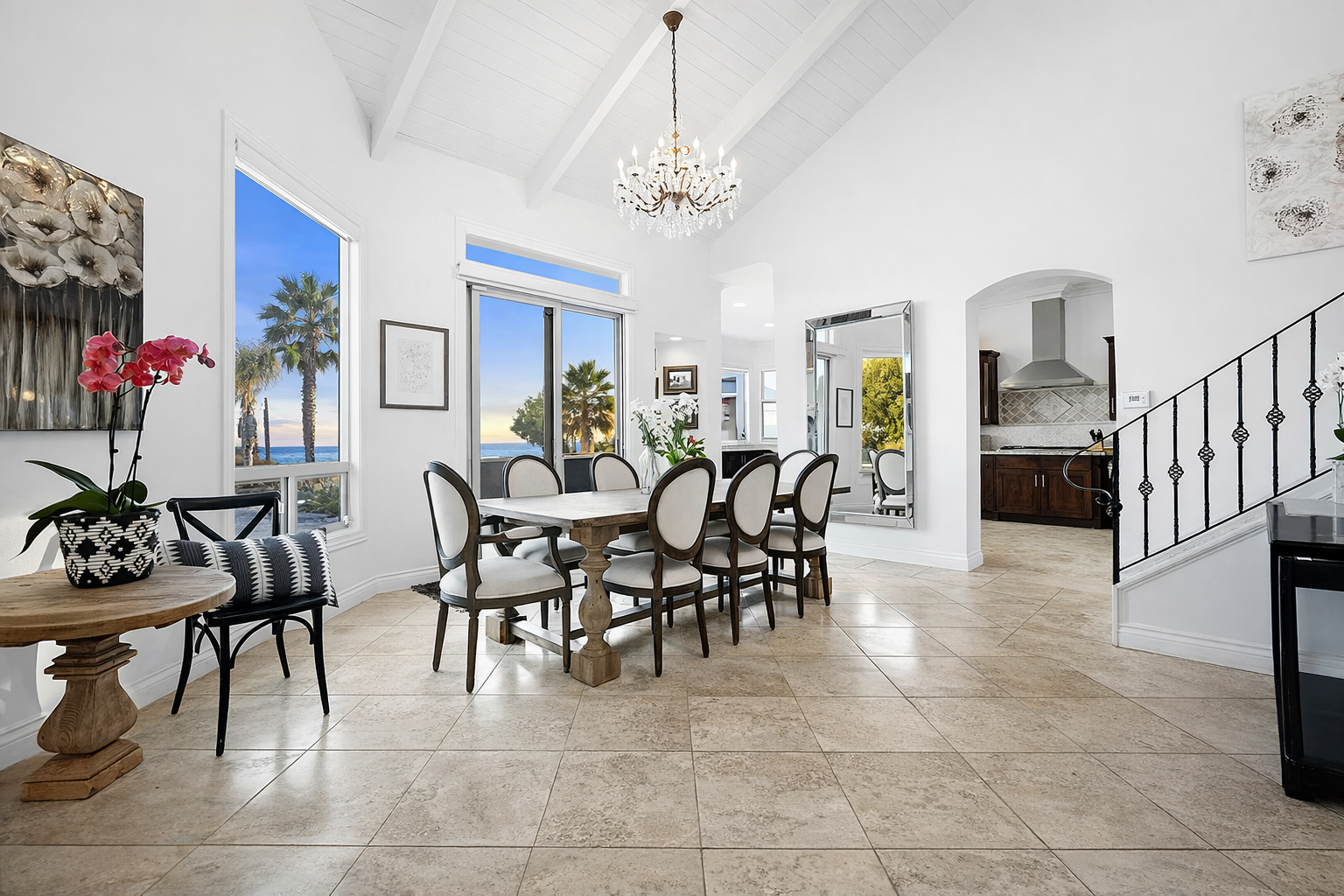 Before remodel dining and living area with ocean views but segmented layout and limited spatial connection