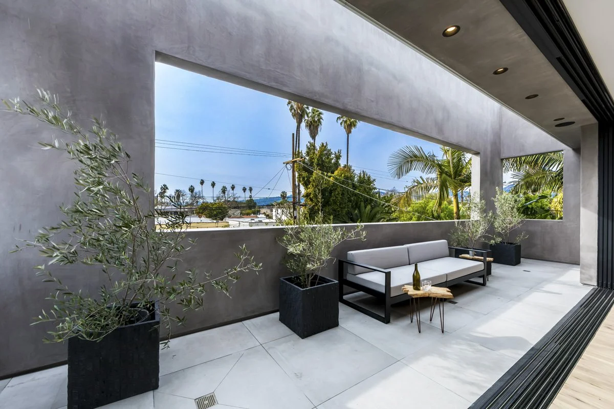 West Hollywood custom home terrace with framed city views and modern outdoor lounge