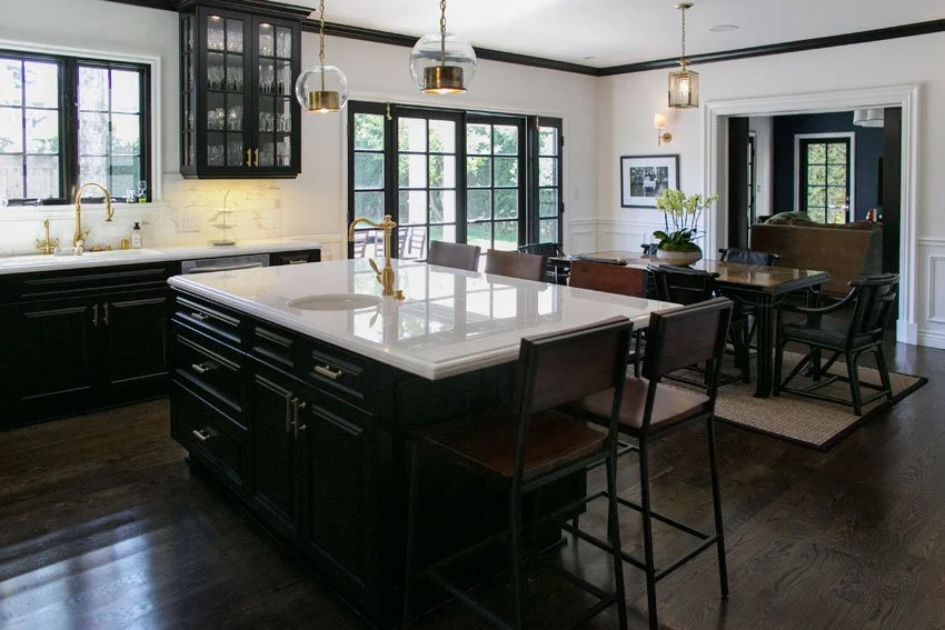 Traditional kitchen renovation with black cabinetry in a Hancock Park Los Angeles residence