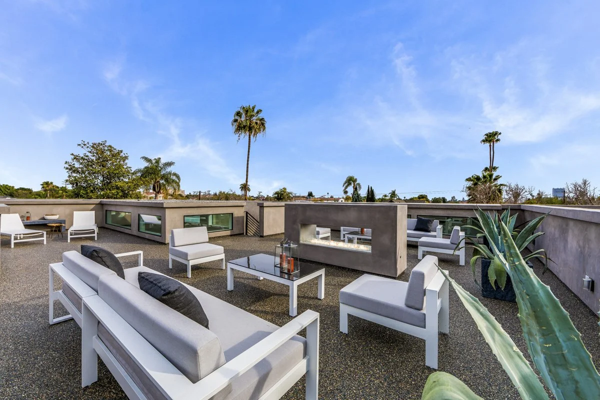 West Hollywood rooftop deck with outdoor lounge seating and fire feature