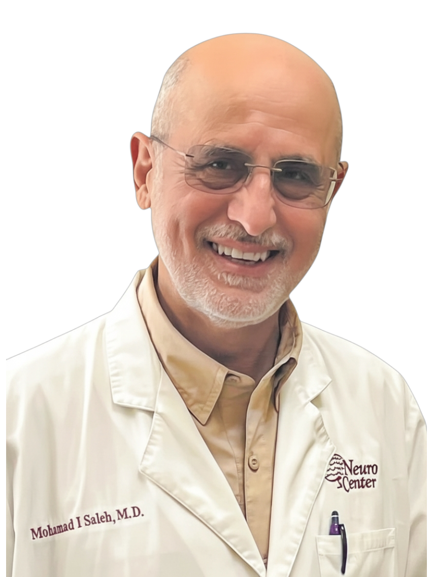 A smiling middle-aged man with glasses and a goatee, wearing a white lab coat with 'Mohamad I Saleh, M.D.' and 'Neuro Center' embroidered on it. He is also wearing a beige collared shirt underneath.