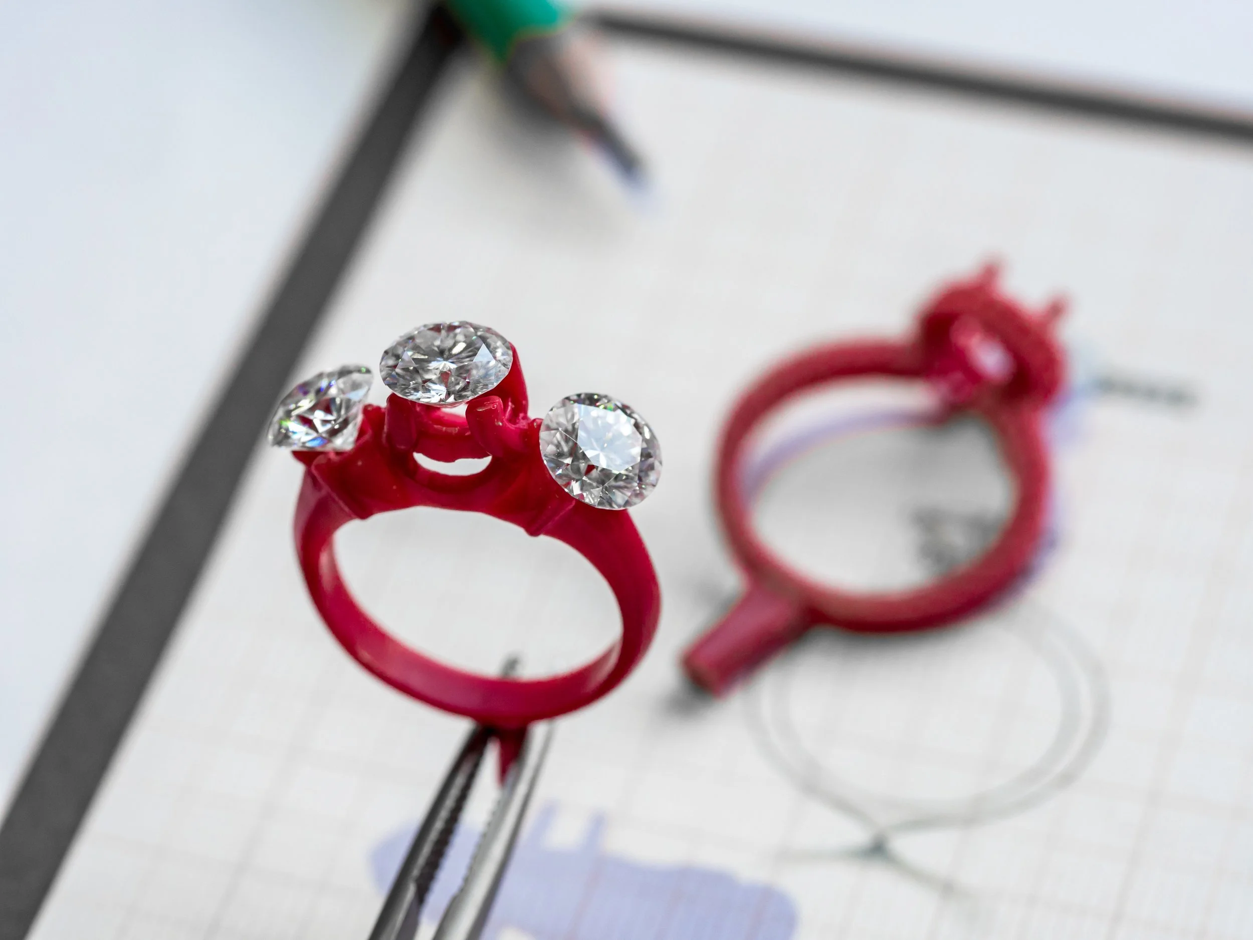 3 stone trilogy ring - bespoke diamond engagement ring design.jpg