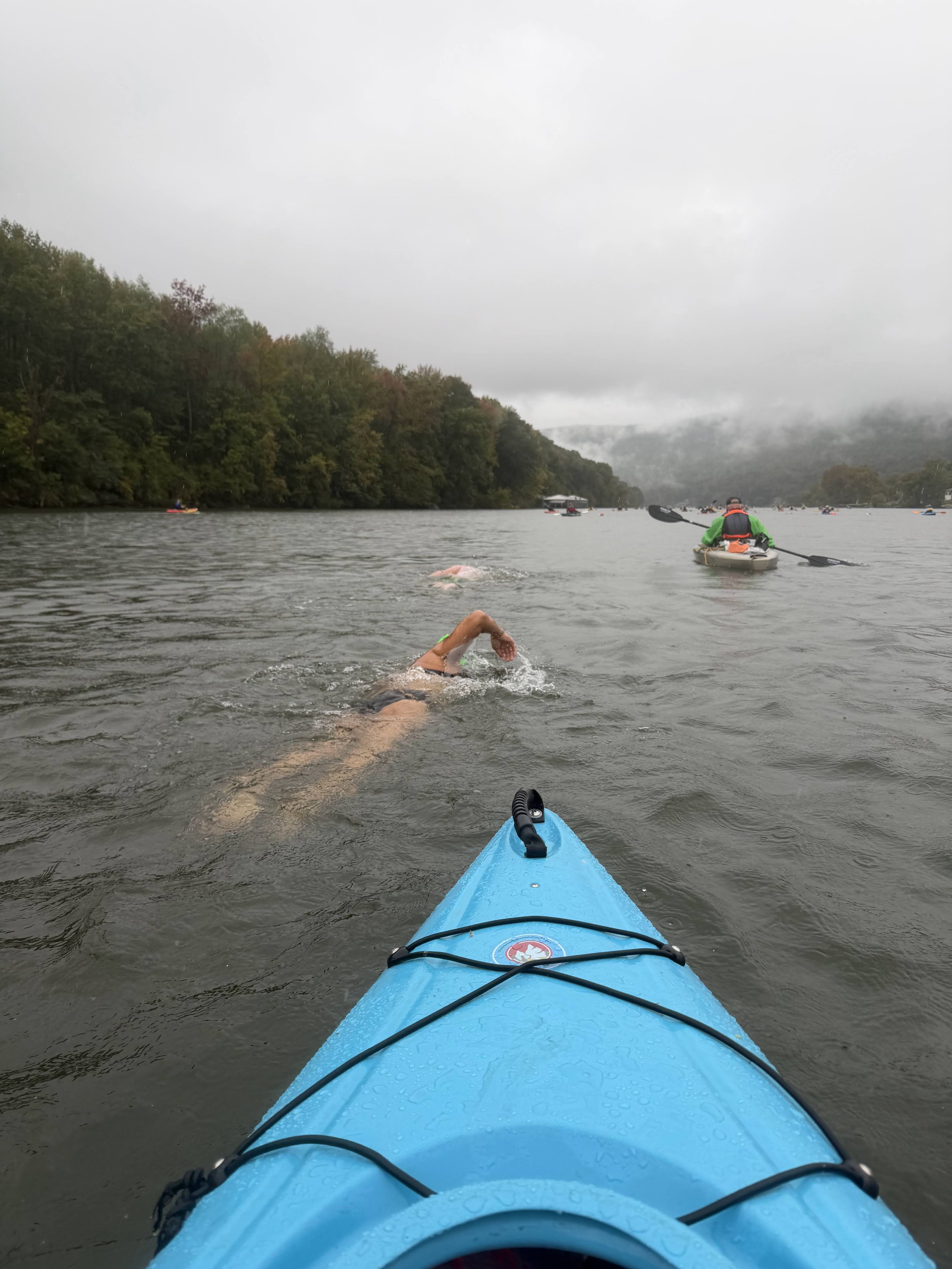 Kayak in foreground, Tennessee River Gorge with swimmer in background