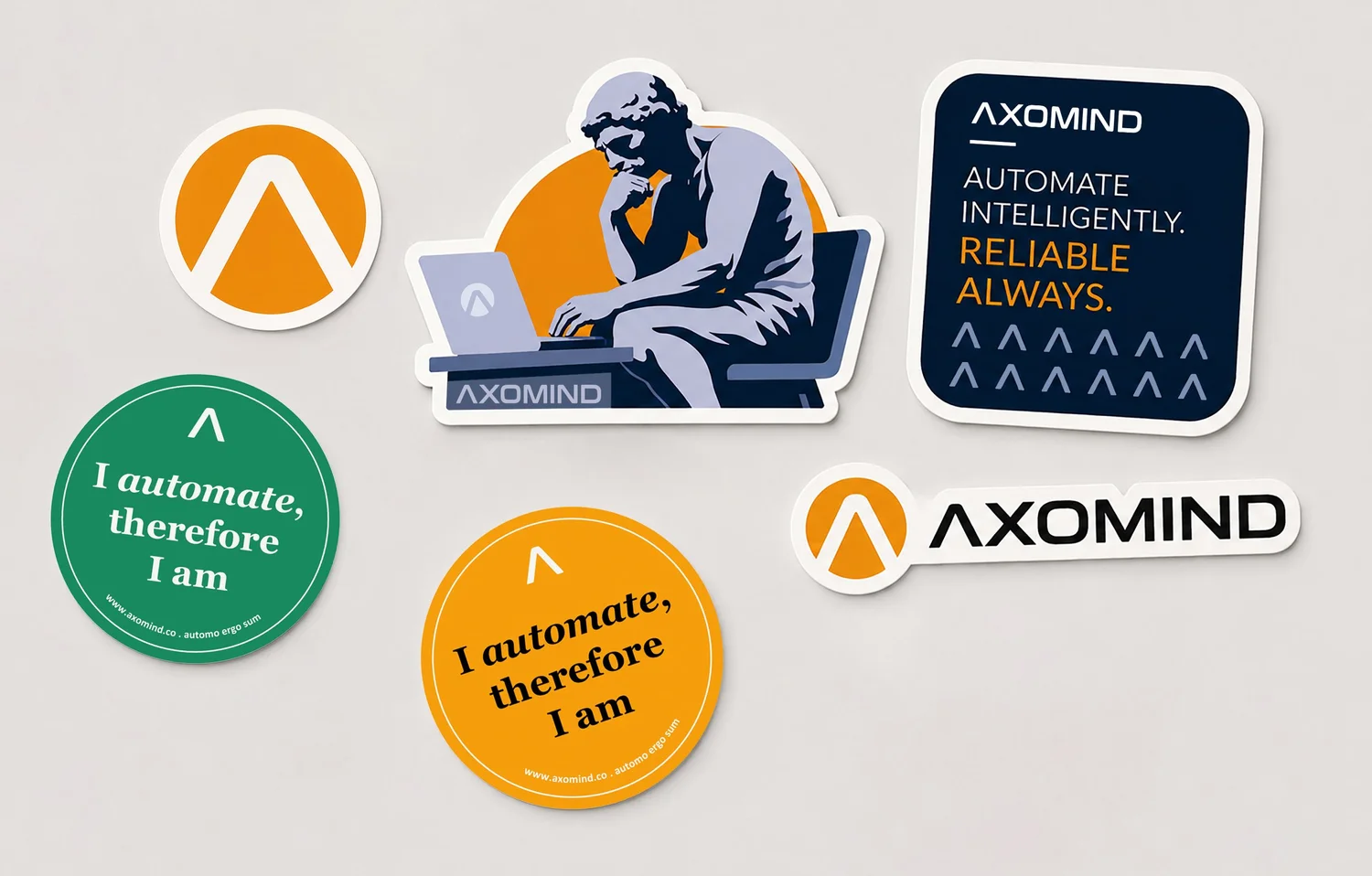 Axomind stickers including the automo ergo sum circle