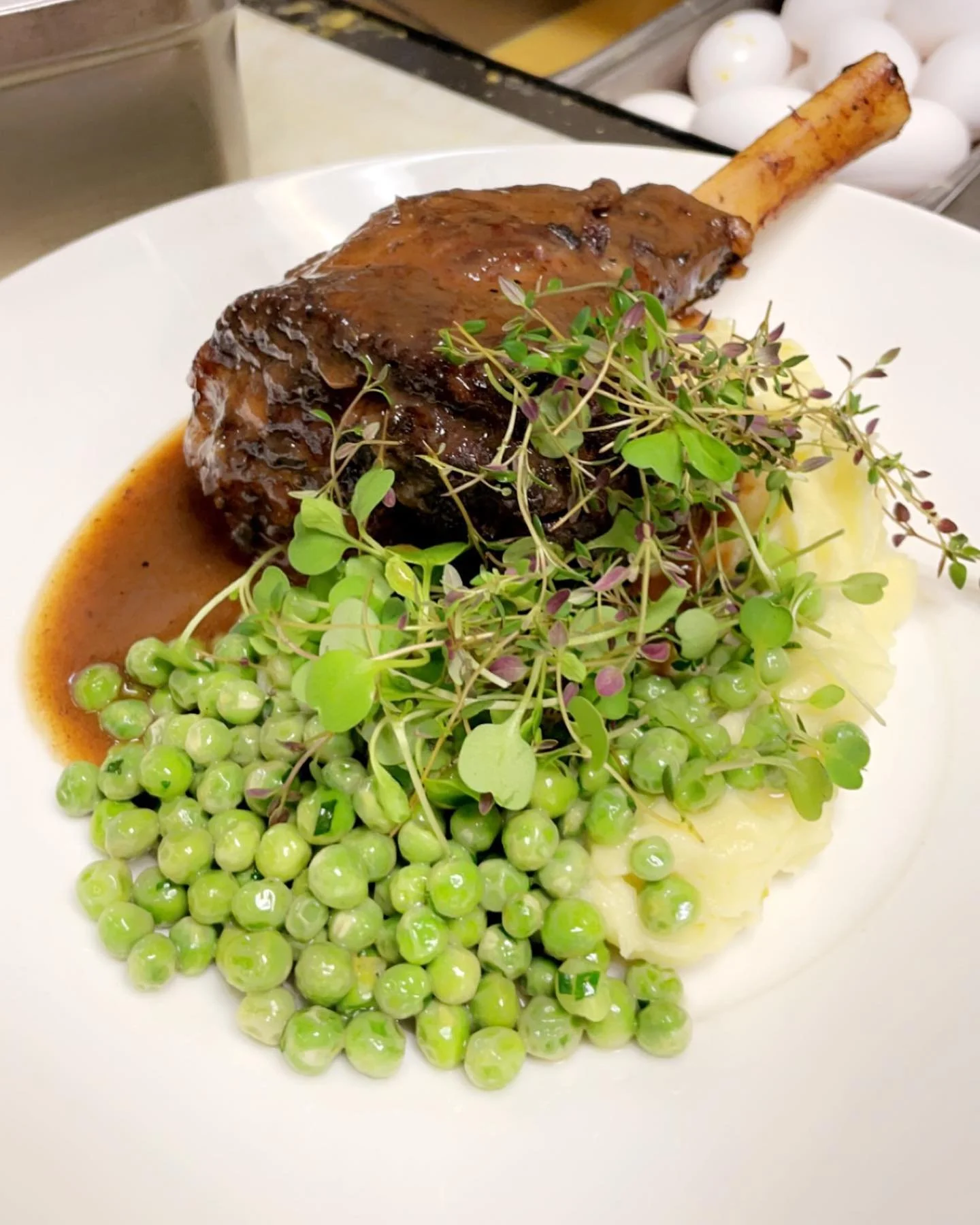 Happy late Easter! Braised Lamb Shank over creamy butter leek potato puree, sauteed peas, beef demi, and micro arugula and thyme!