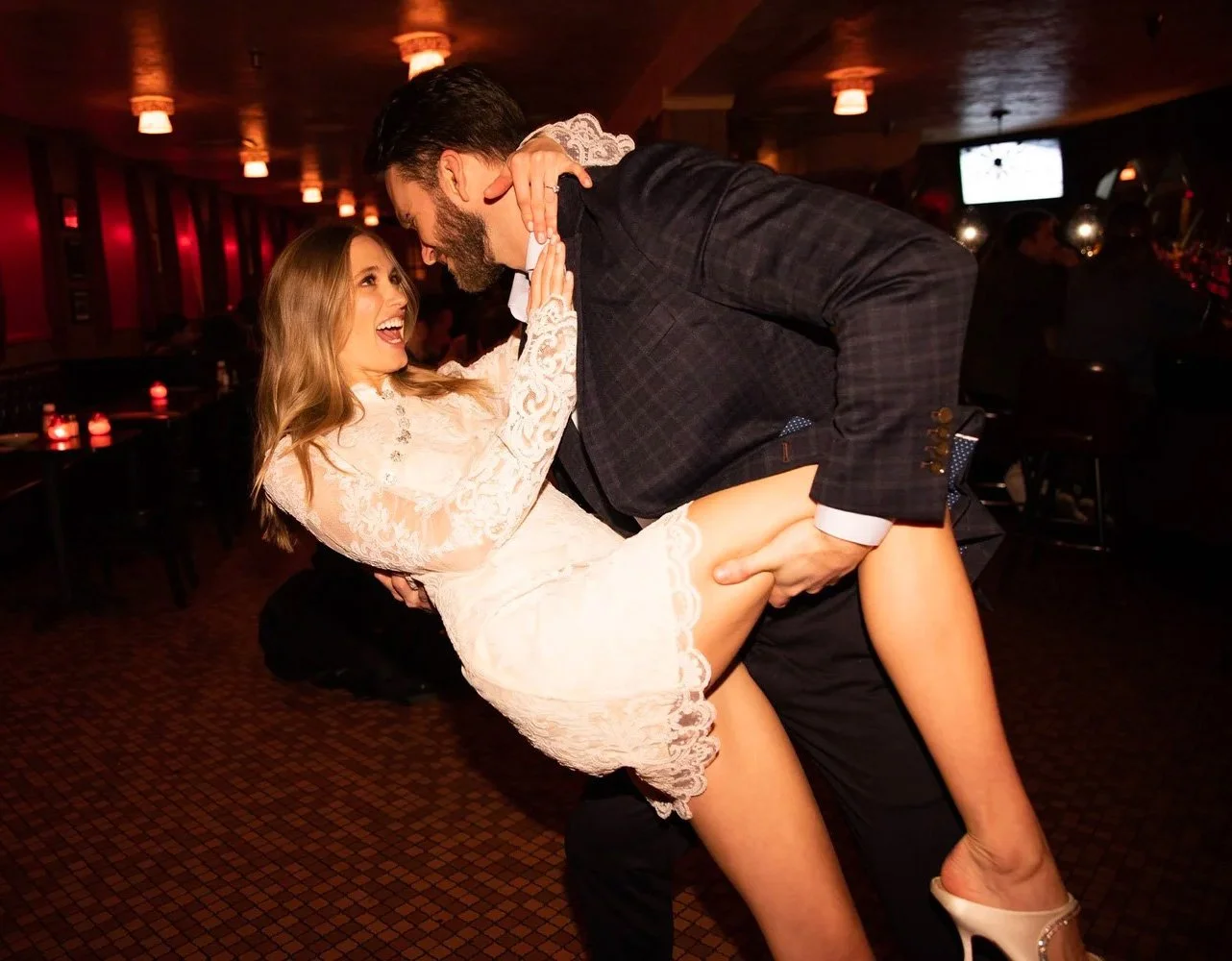 Editorial engagement photography by fashion photographer Conor Doherty high heels white dress dip