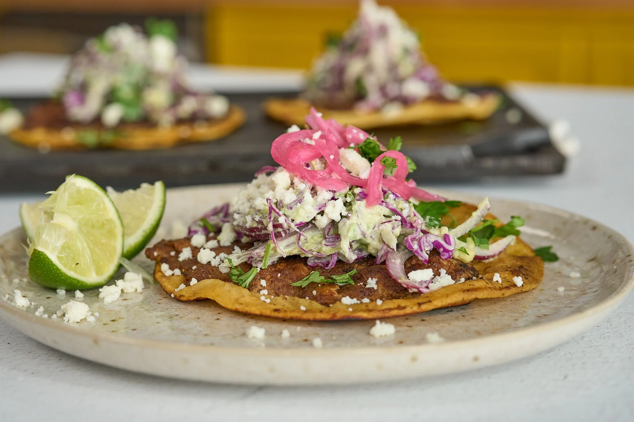 Spiced Lamb Smash Tacos with Guac-Slaw