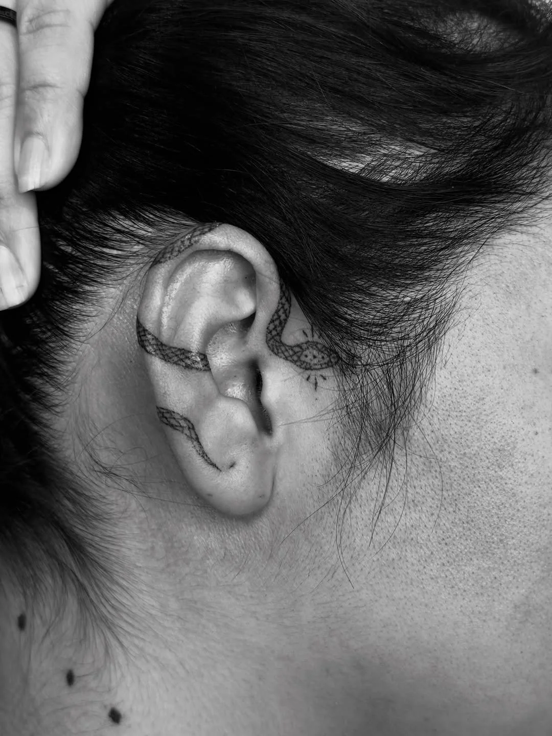 Light Light Ear Snake Tattoo