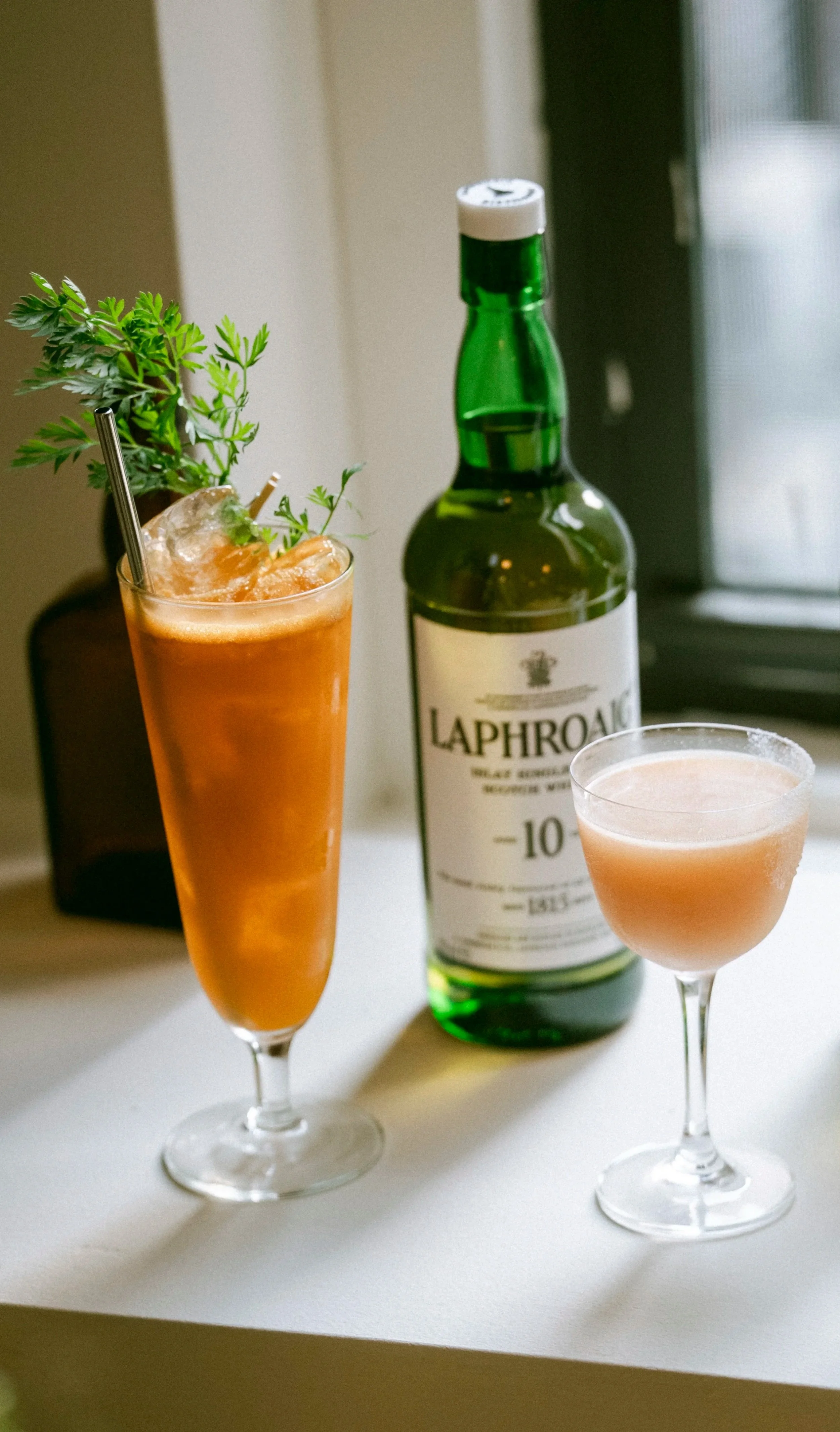 For Laphroaig Scotch.

 On the Left: Carrot
 Toasted Barley
 Caraway
 Honey
 Laphroaig

 On the Right:
Rhubarb
 Salted Yoghurt
 Peychaud's Bitters
 Sweet Vermouth
 Laphroaig
