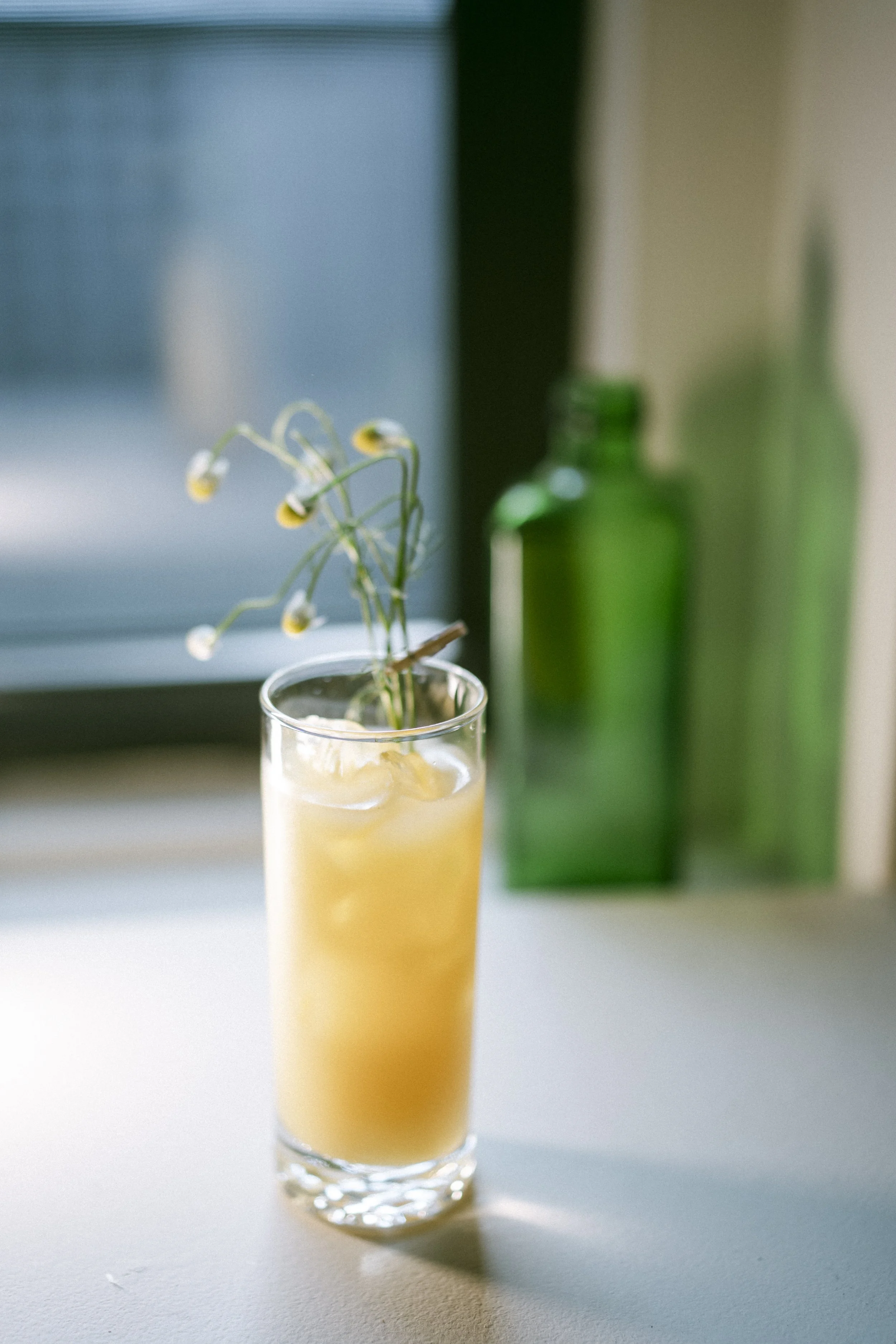 Nonalc, for Laphroaig.

 Sencha Tea
 Toasted Rice
 Caramelized Pineapple
 Sea Buckthorn
 River Sage