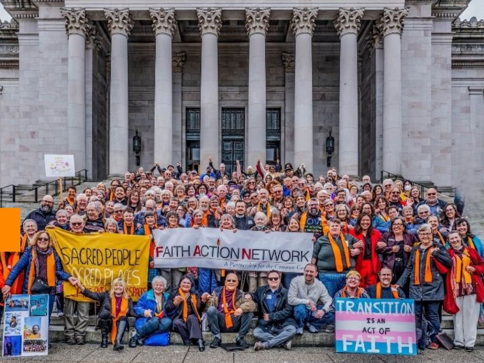 A large group of people stand in front of the legislative building in Olympia Washington to express their faith and advocate for issues to their legislators.