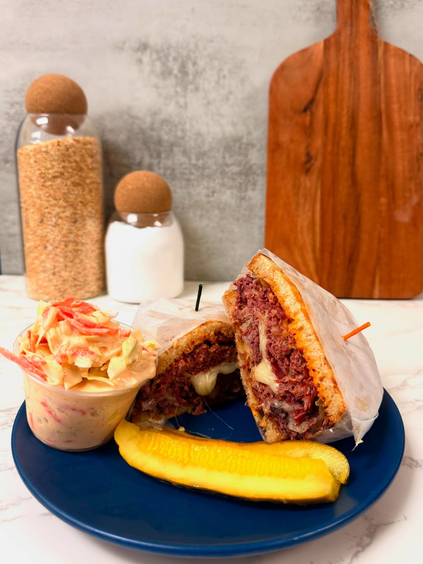 Meet the Reuben: Pastrami piled high, sauerkraut dancing in Russian, all on toasted rye. Comes with a salad and pickle sidekick—because legends deserve a full spread.” 🥪🥒🥗 #BagelRun #ReubenRoyalty #LunchDone