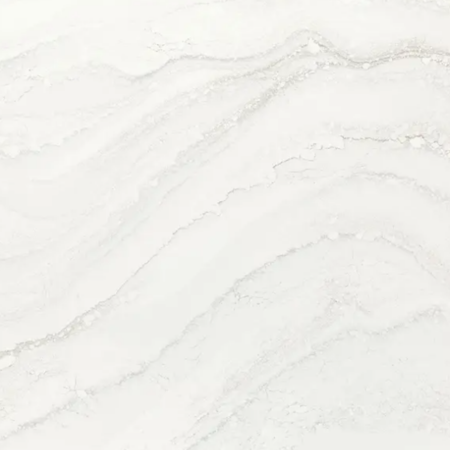 Close-up of a white marble surface with subtle gray veining.