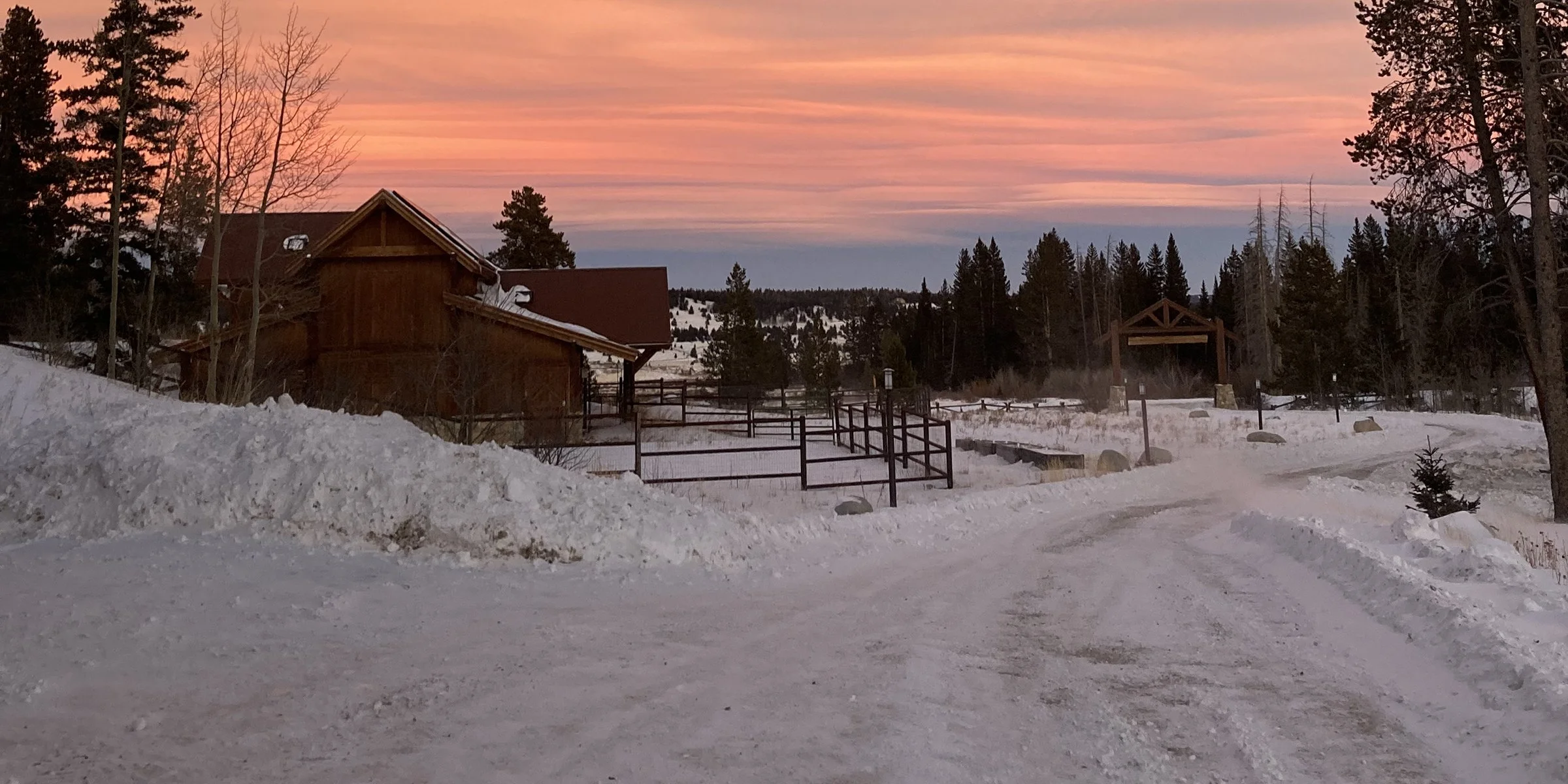 Snow covered barn at Mountain Area Land Trust retreat