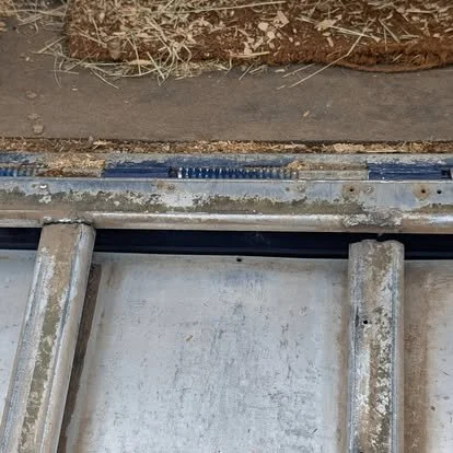 Cracked aluminum horse trailer ramp before TIG welding and structural repair.