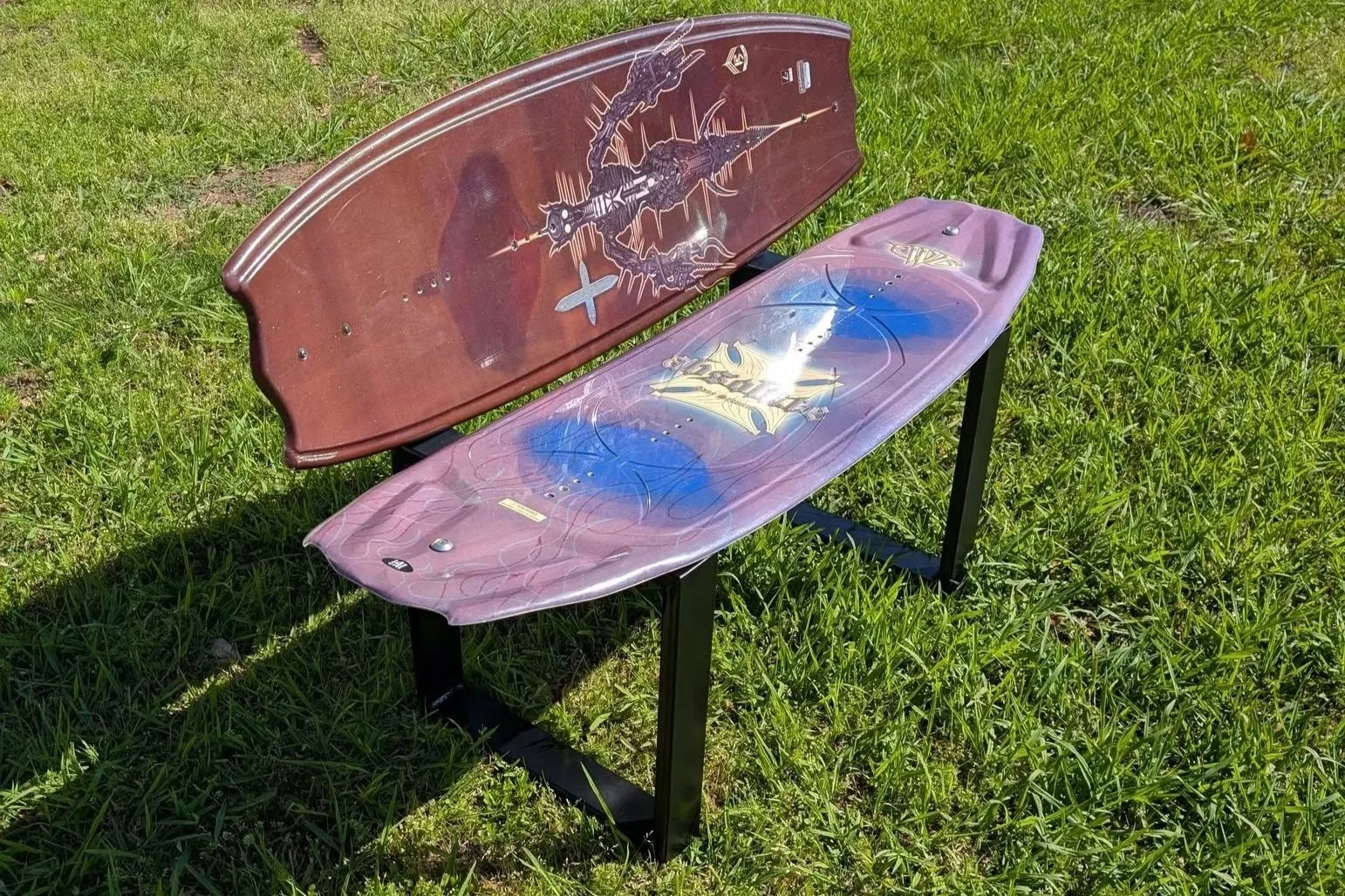 Custom steel bench fabricated with repurposed snowboards and welded metal frame.