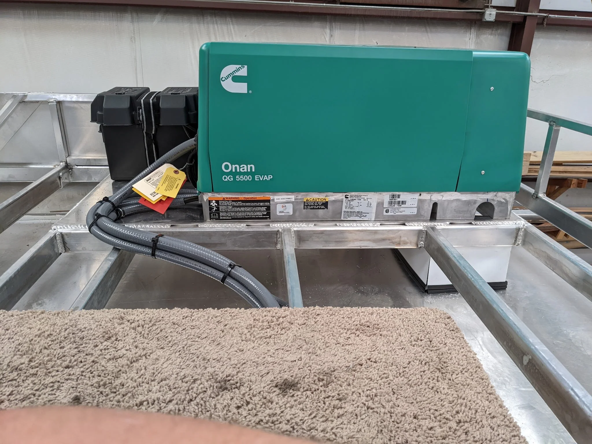 Custom aluminum RV generator rack fabricated for an Onan generator in Collinsville, TX