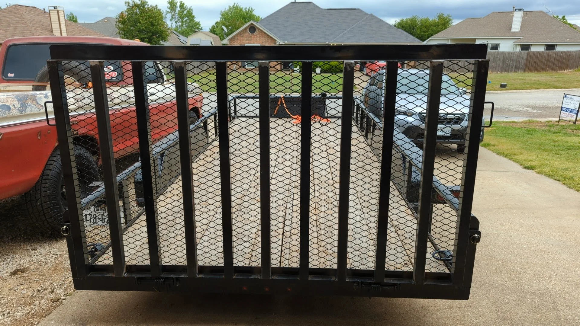 Trailer ramp repair with reinforced expanded metal mesh and welded steel supports by JH Tig Works LLC.