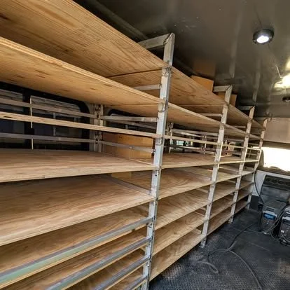 Custom aluminum shelving frames fabricated for a mobile bus conversion by JH Tig Works LLC.