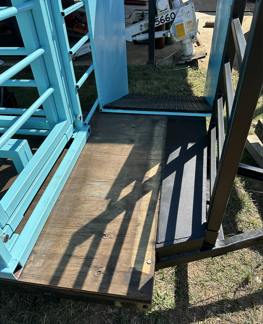 Custom fabricated loading ramp extension designed for safer livestock movement.