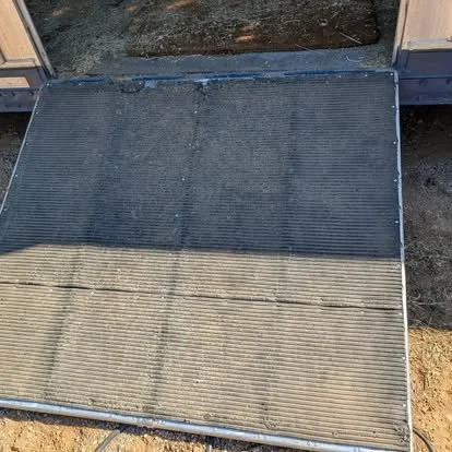 Repaired aluminum horse trailer ramp after TIG welding and structural reinforcement.