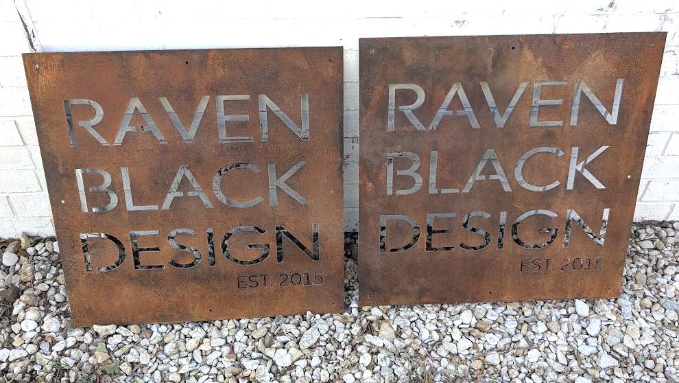 Custom CNC plasma cut Raven Black Design steel signs with cutout lettering and natural rust finish.