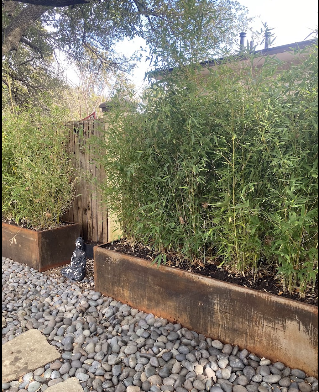 Large custom fabricated Corten steel landscape planter with natural rust patina