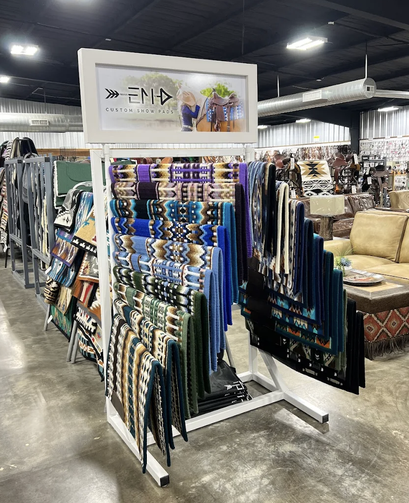 The finished custom horse blanket rack, fully displayed. Designed for both strength and visual appeal, perfect for barns or retail display.