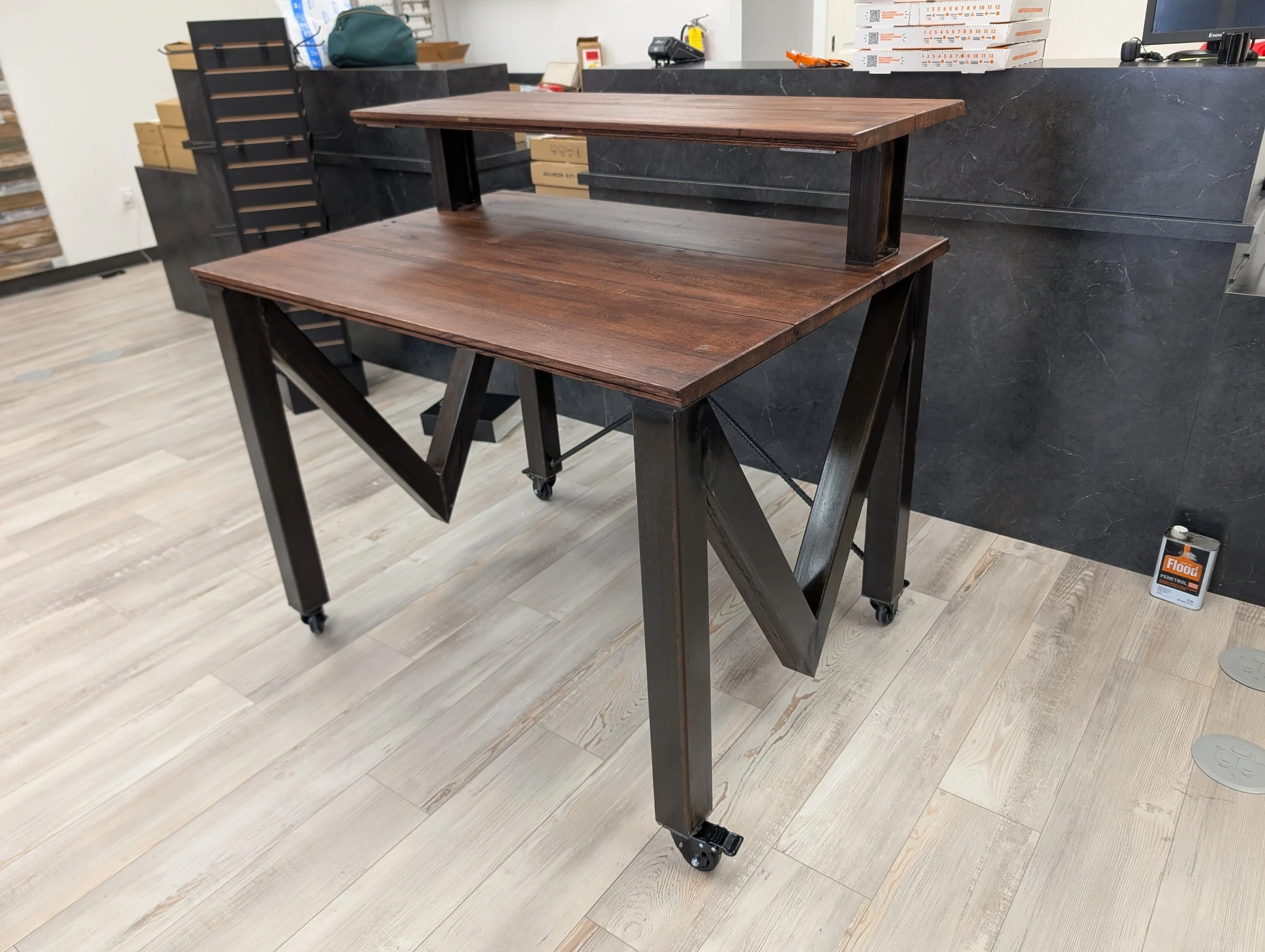 Custom two-tier commercial display table with welded steel frame fabricated by JH TIG WORKS in North Texas