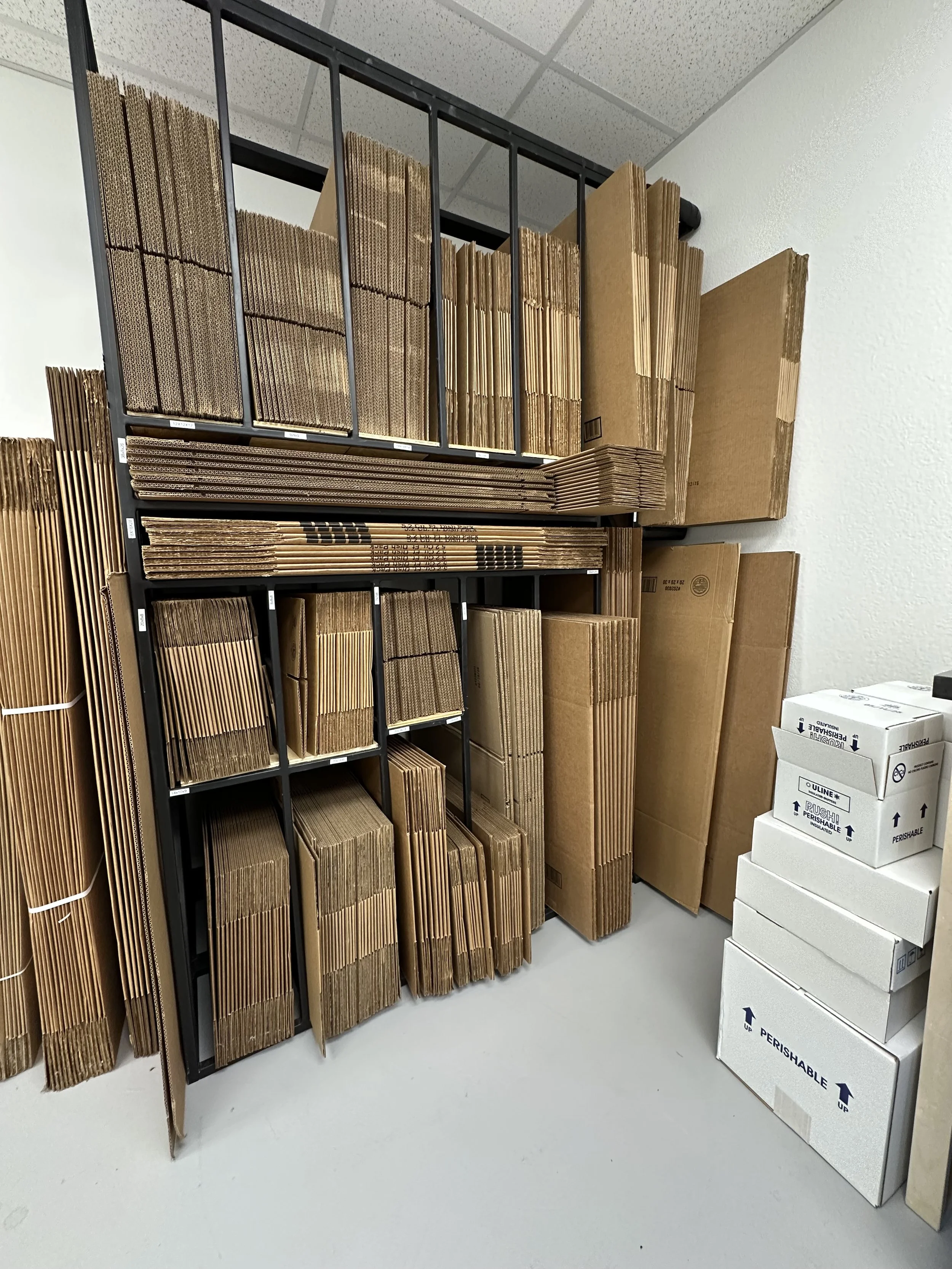 Custom steel storage rack fabricated for organizing and storing cardboard boxes in North Texas