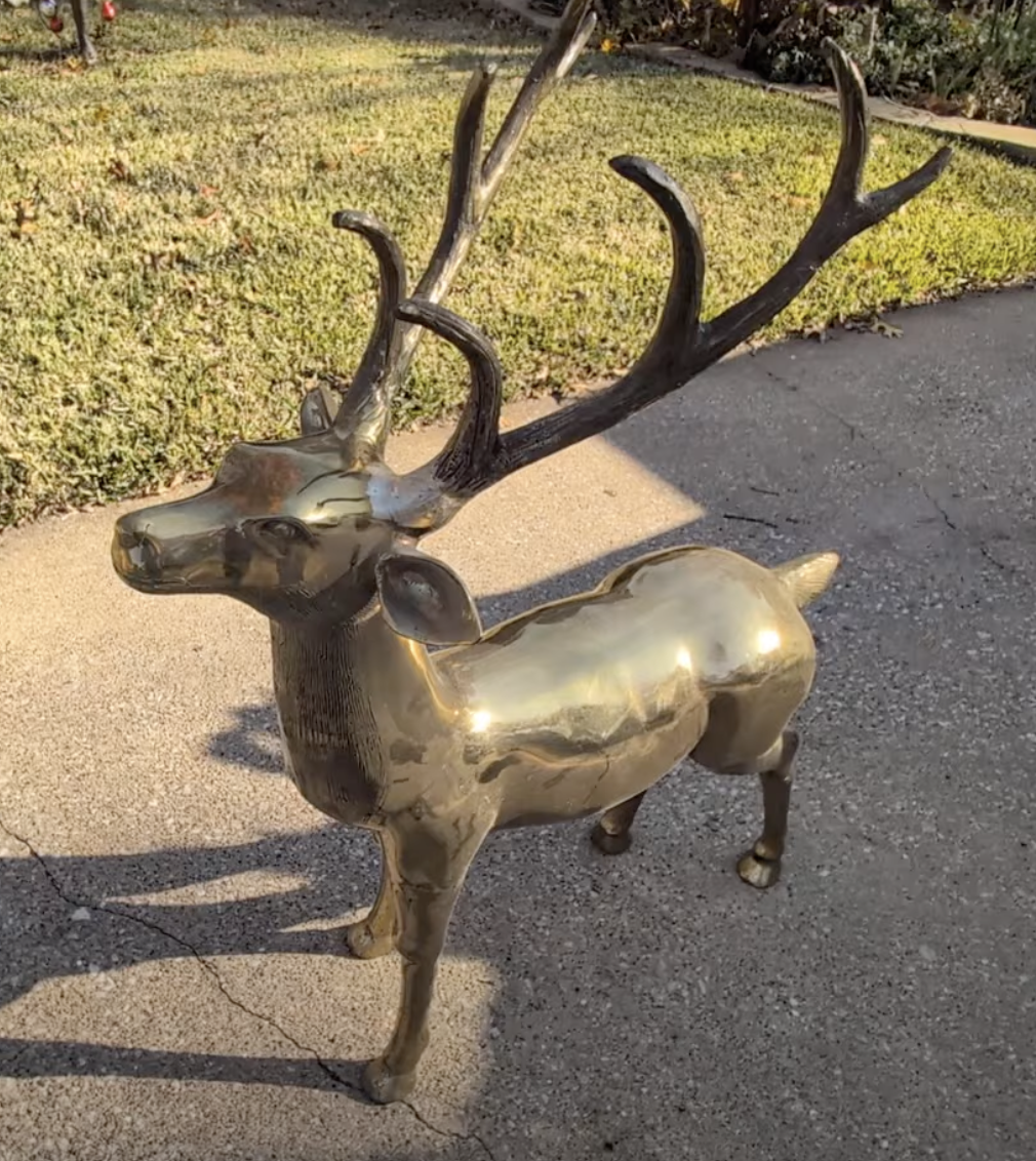 Brass deer sculpture after custom welding and antler repair by JH TIG WORKS in North Texas