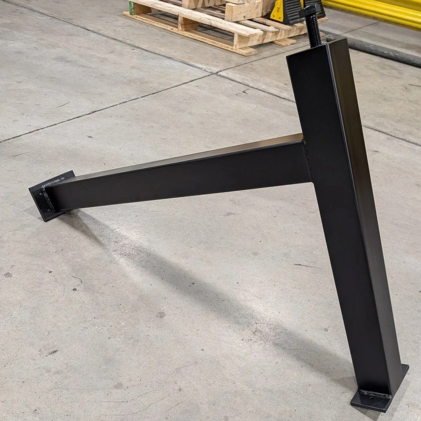 Custom welded steel fixture table leg fabricated by JH Tig Works LLC in North Texas