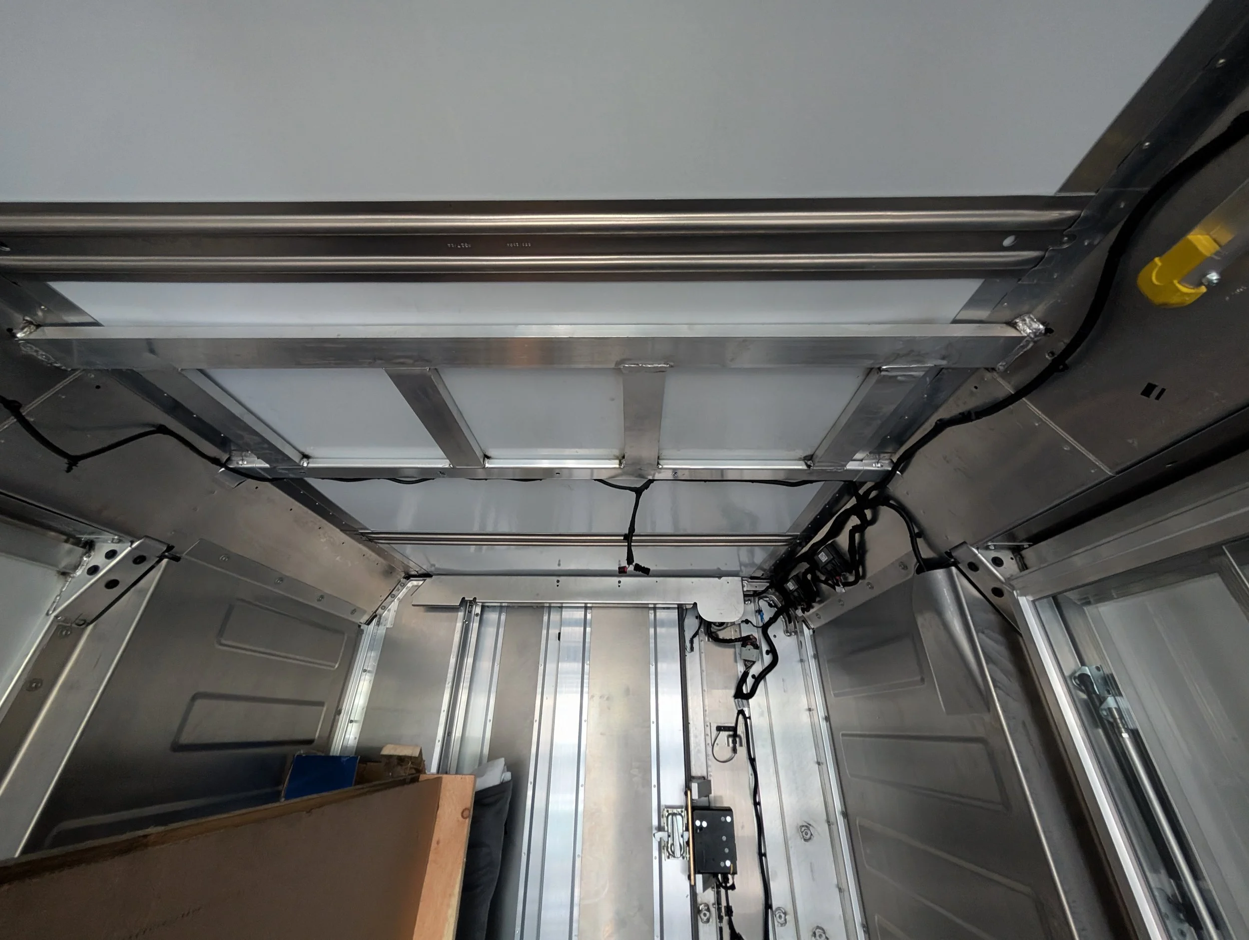 Interior view of custom aluminum framing welded for an ice cream truck serving window