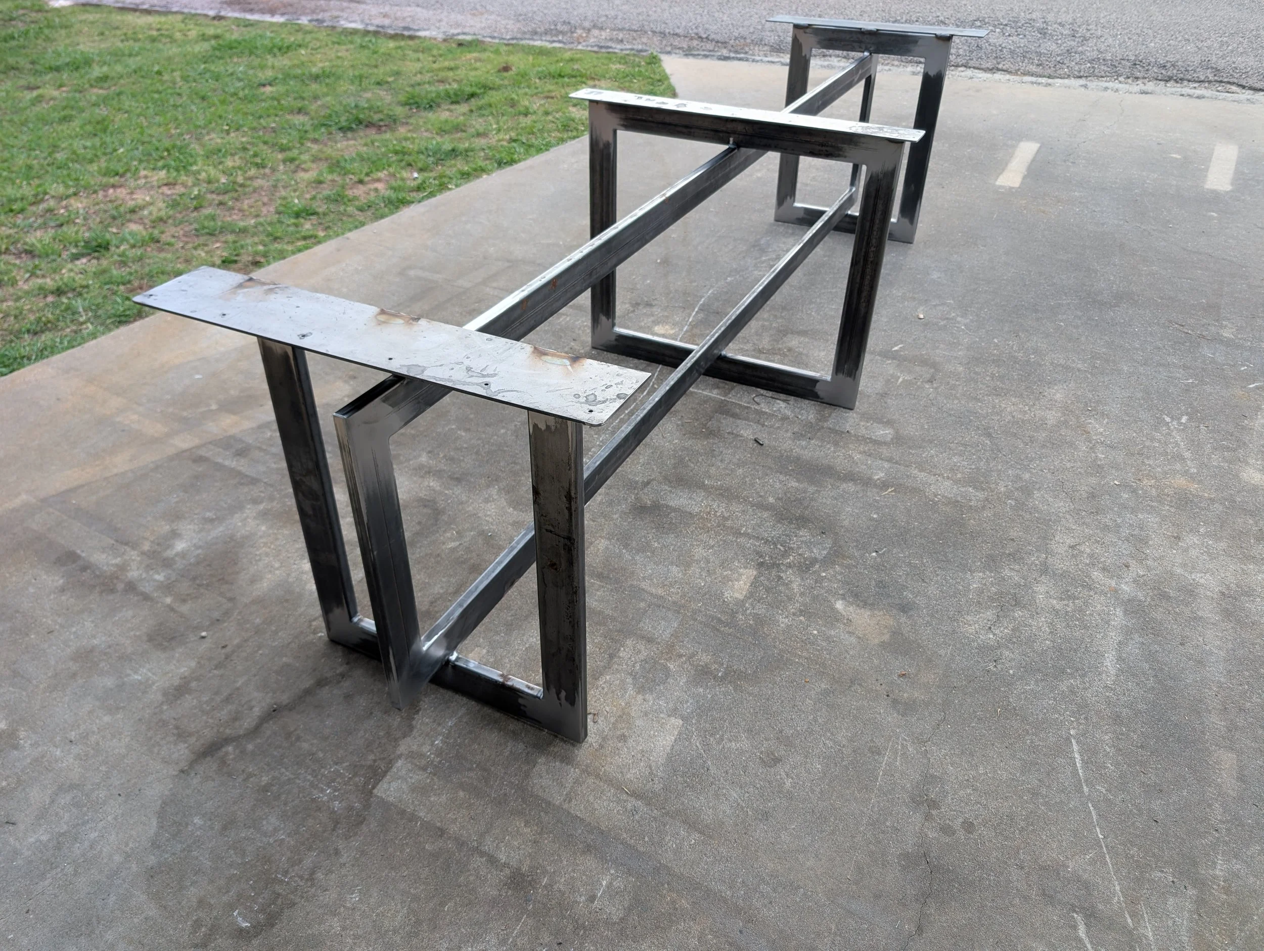 Welded steel conference table frame during custom fabrication