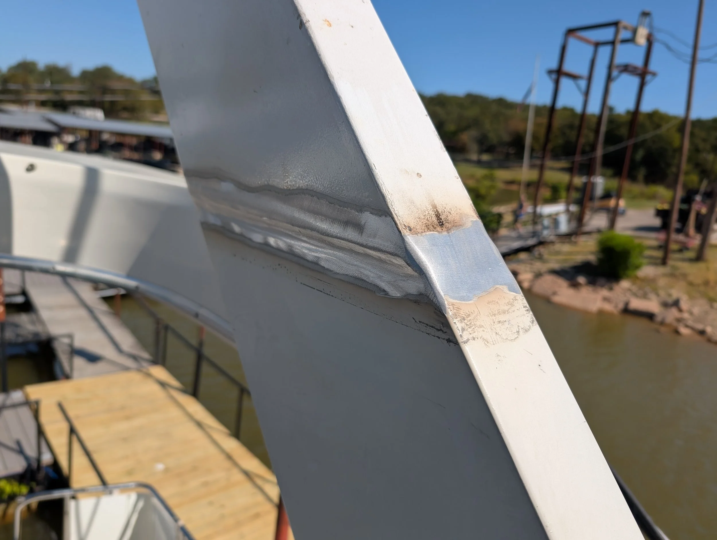 Close-up of aluminum boat frame welding repair completed by JH TIG WORKS in North Texas
