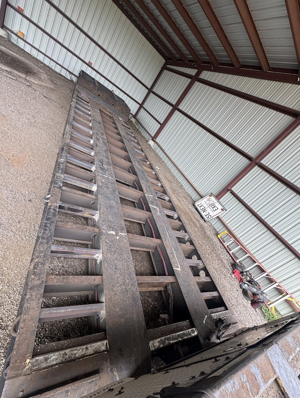 Steel equipment trailer repair with reinforced crossmembers and welded supports by JH Tig Works LLC.
