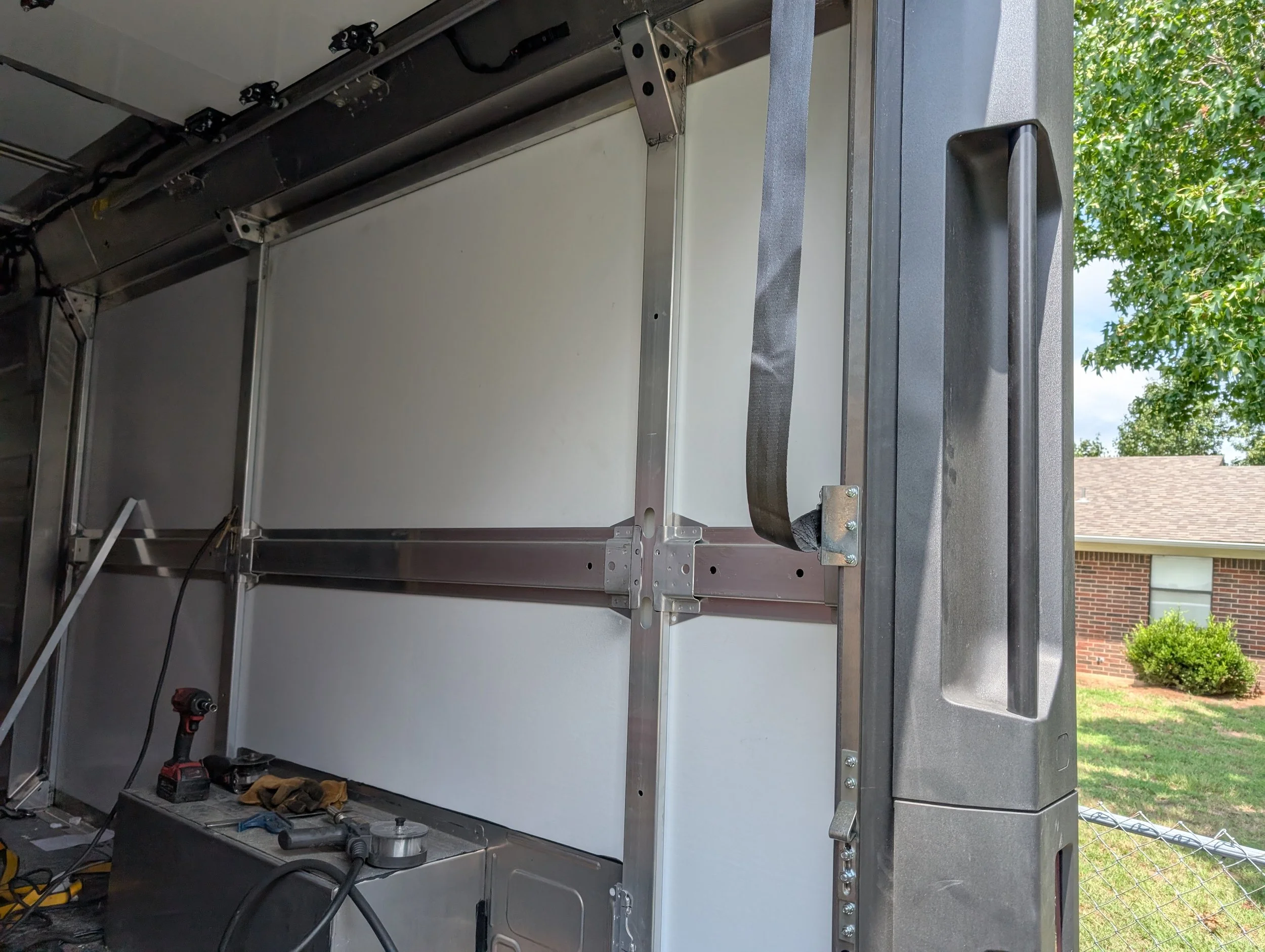 Custom aluminum serving window frame fabricated for an ice cream truck by JH Tig Works LLC