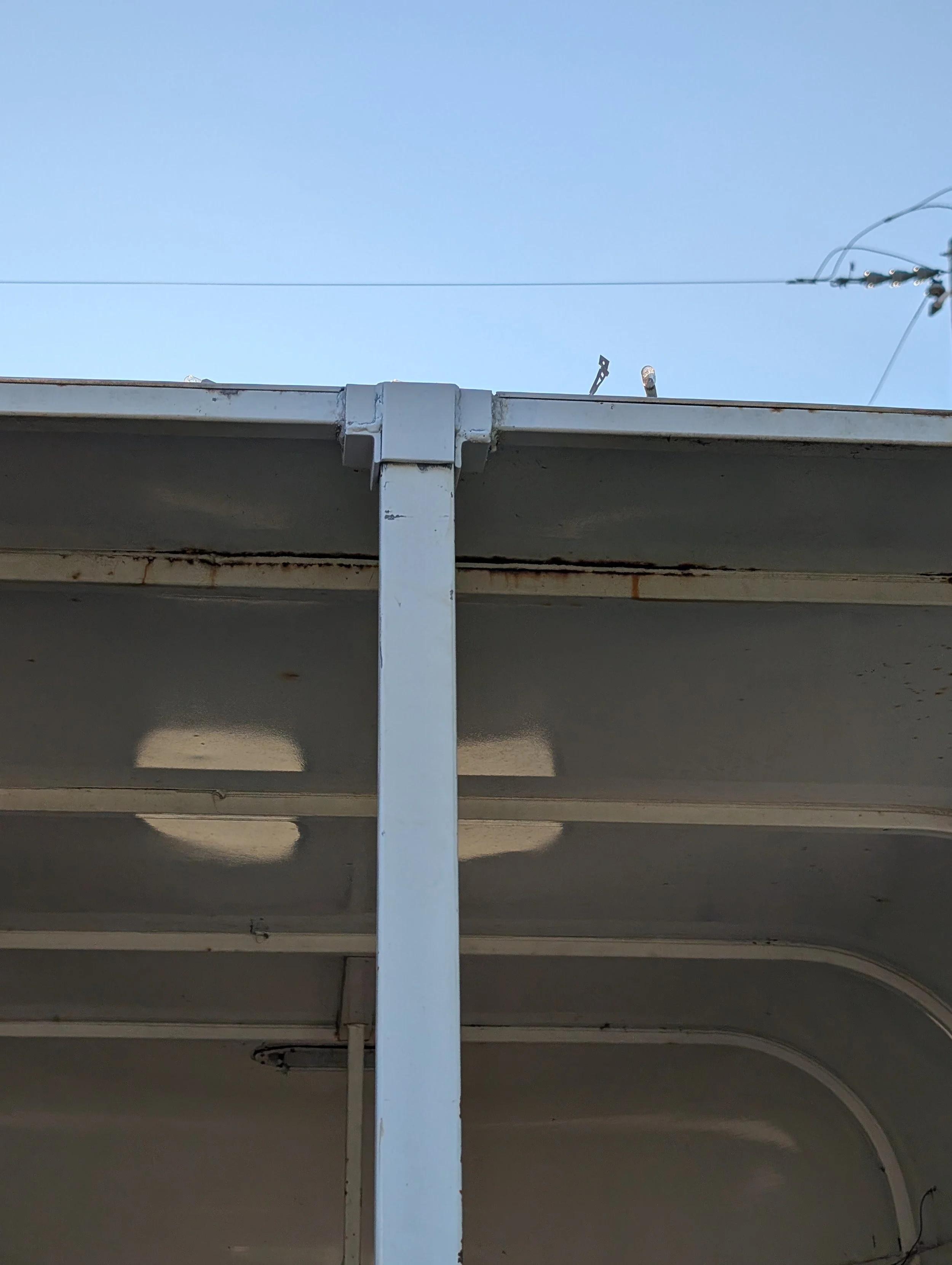 Modified removable center post and upper mount on a repaired steel horse trailer by JH Tig Works LLC.