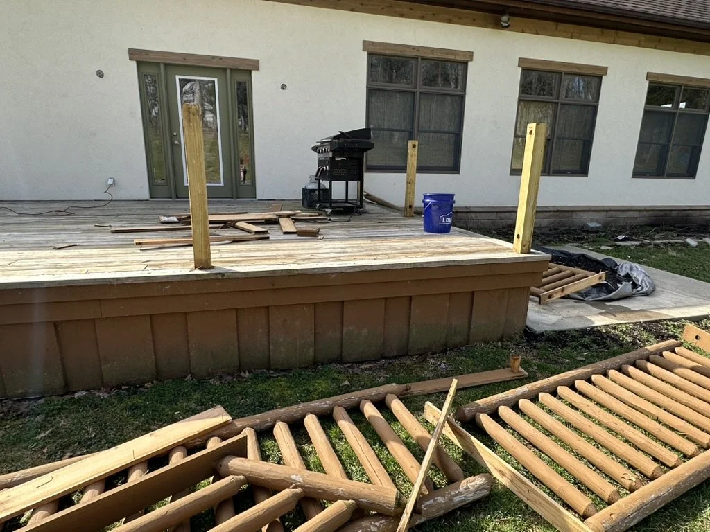 Custom steel patio railing frame fabricated and installed before cable installation.