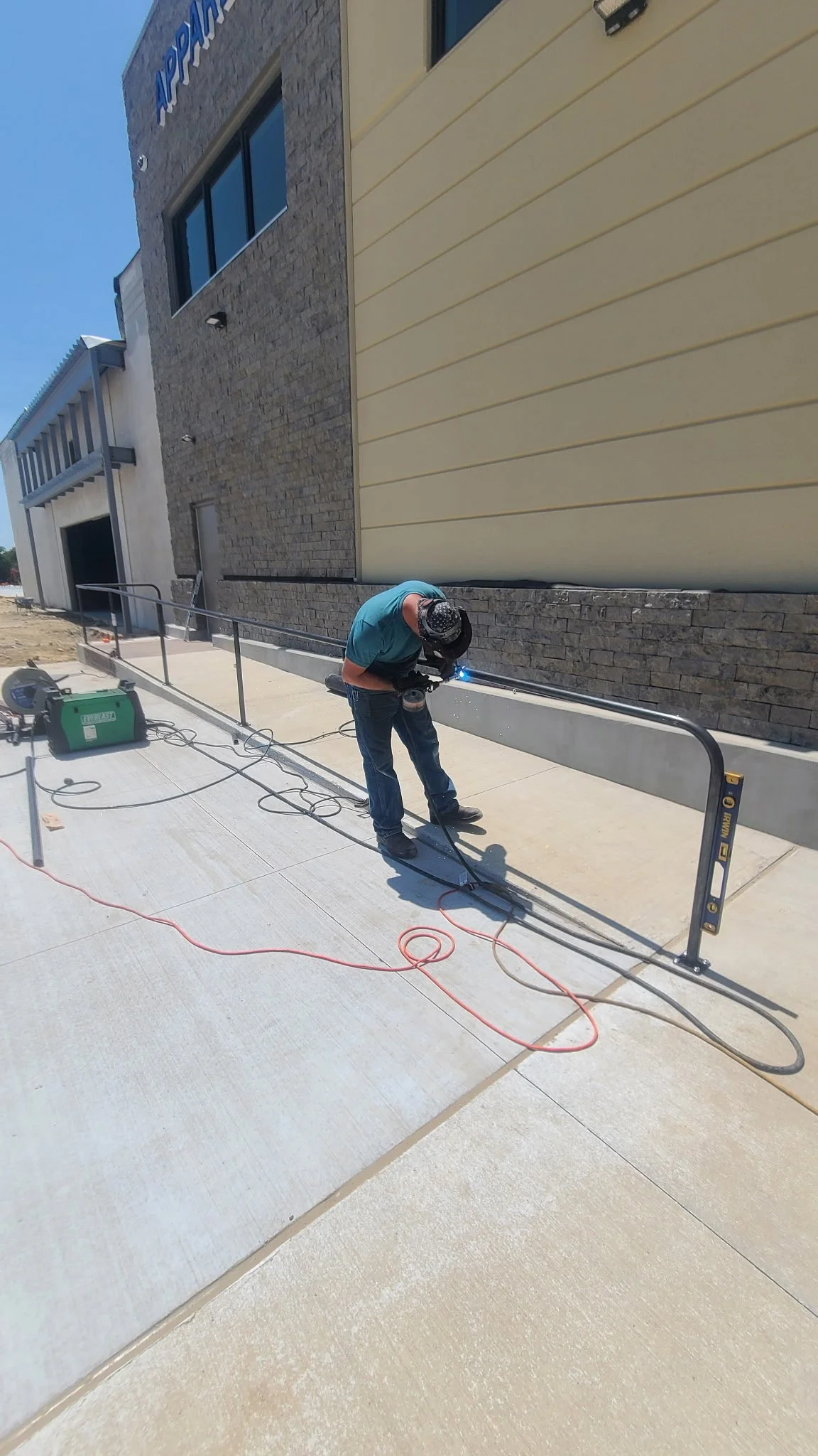 Commercial steel ADA handrail fabricated and installed by JH Tig Works LLC in Celina, Texas