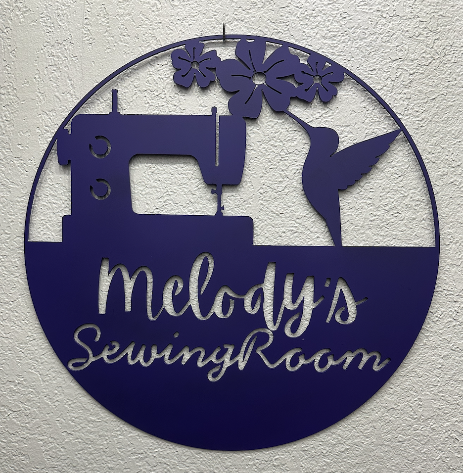 Custom hummingbird sewing room metal sign with sewing machine, flowers and personalized name, CNC plasma cut by JH Tig Works LLC.