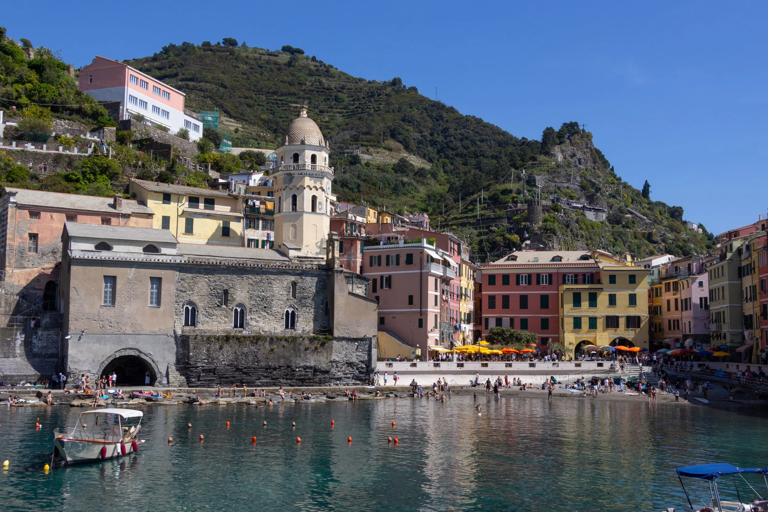 Cinque Terre, Italy | A historic church overlooking the waterfront in Cinque Terre.