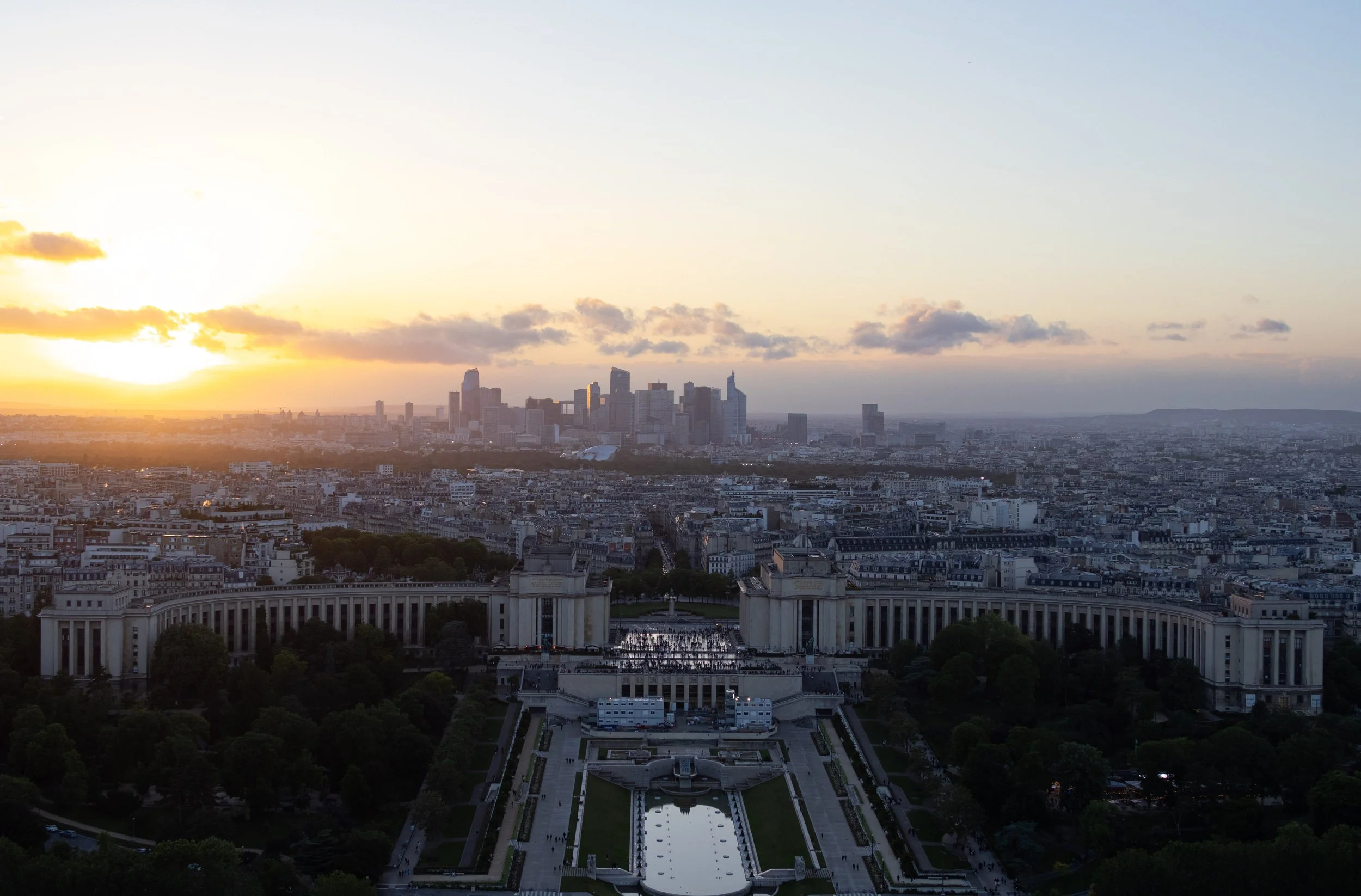 Paris, France | Sunset over Paris with La Defense visible on the horizon.