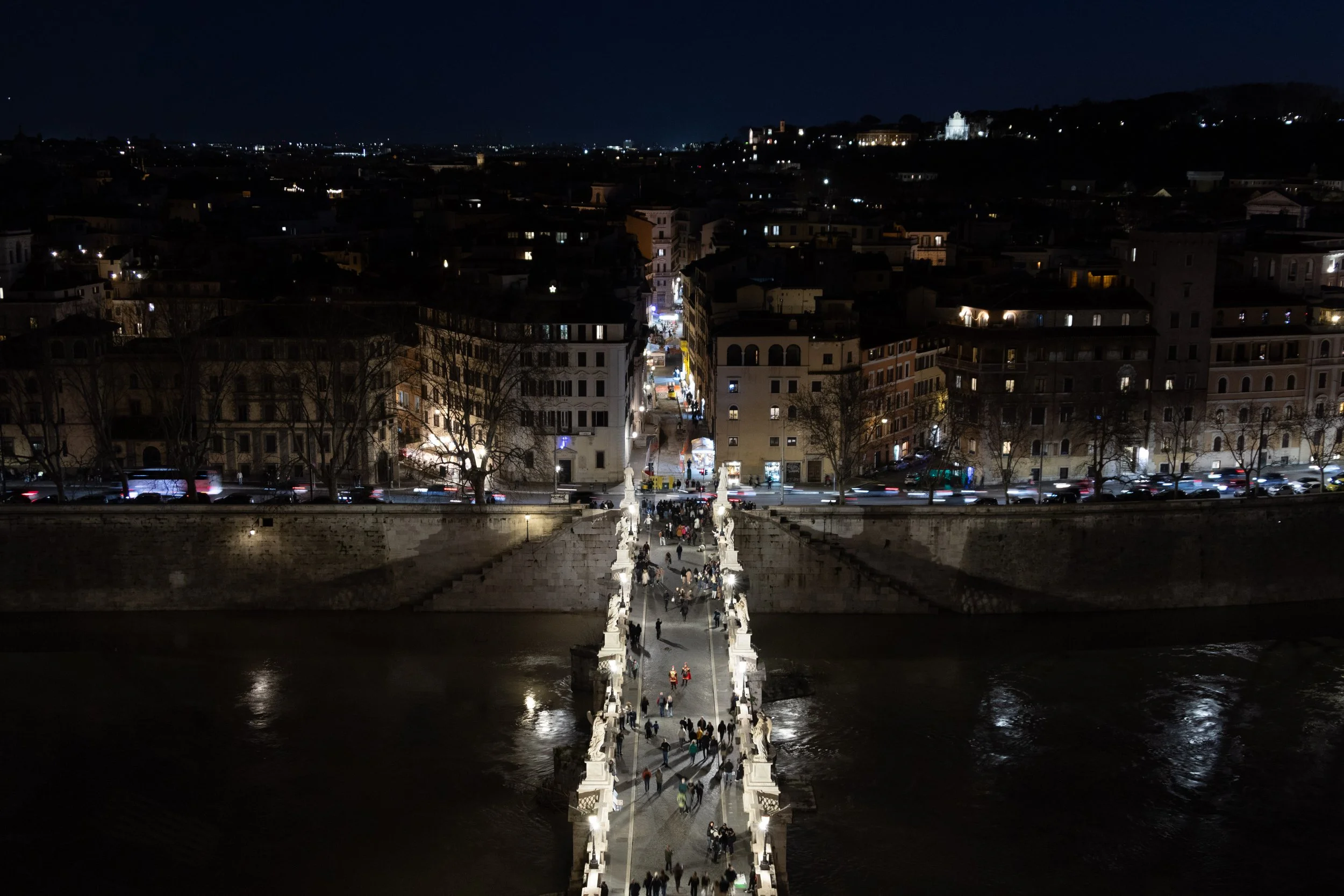 Rome, Italy | Night view from Castel Sant'Angelo overlooking Ponte Sant'Angelo. 