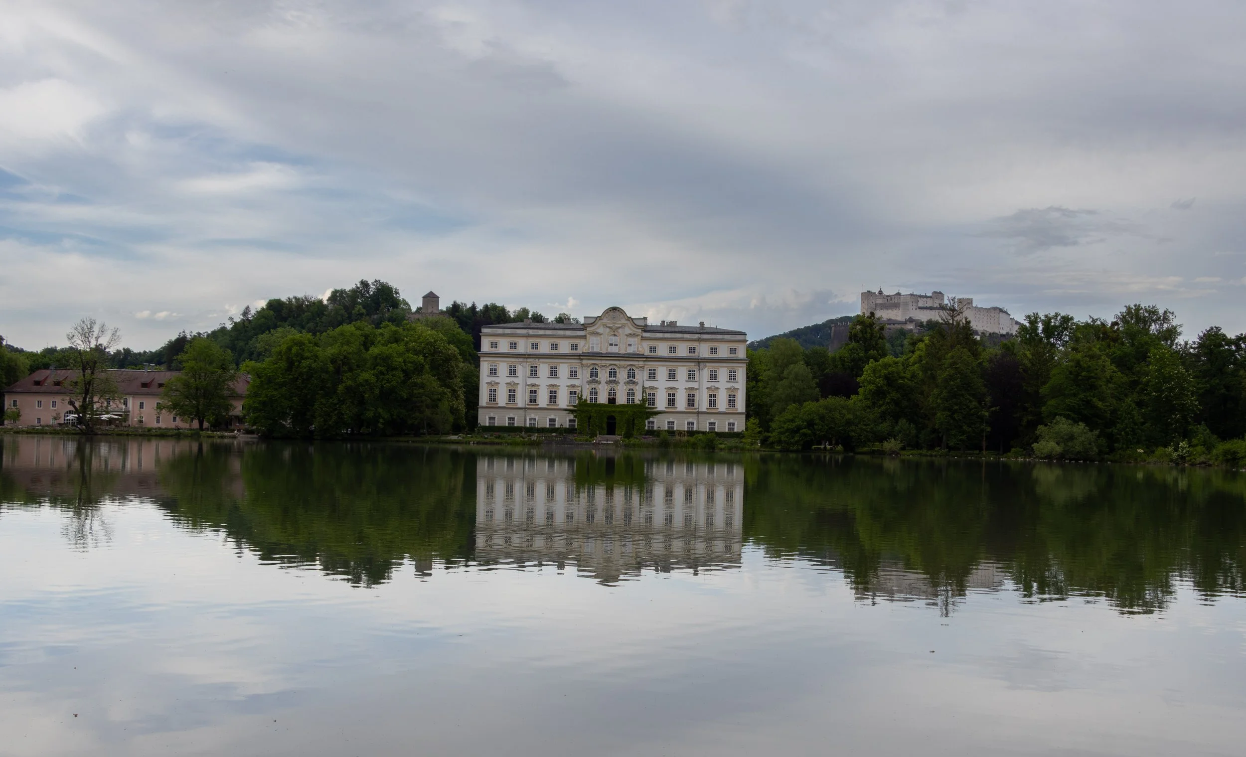 Salzburg, Austria | Hotel Schloss Leopoldskron reflected in the water. 