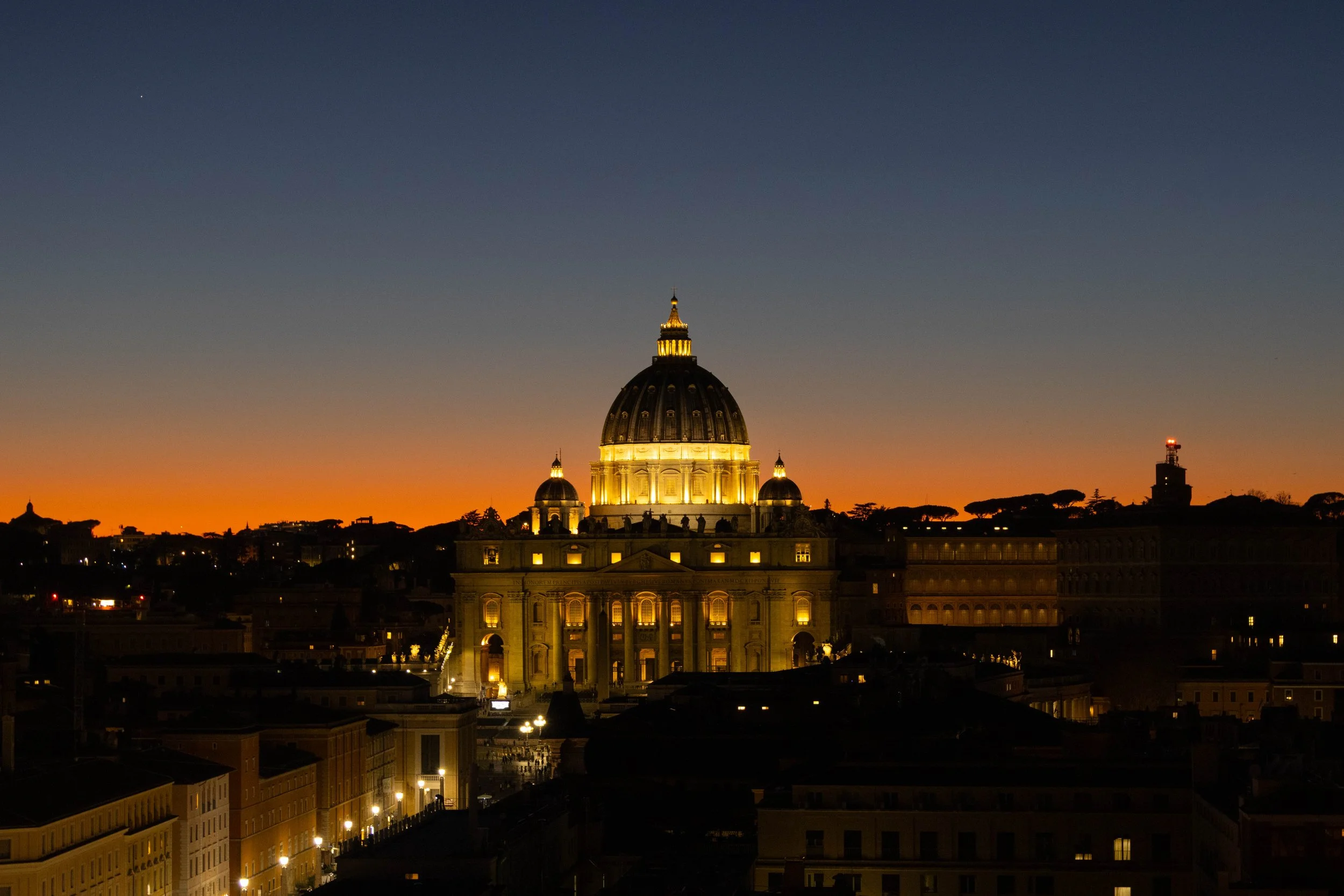 Rome, Italy | Sunset over St. Peter's Basilica.