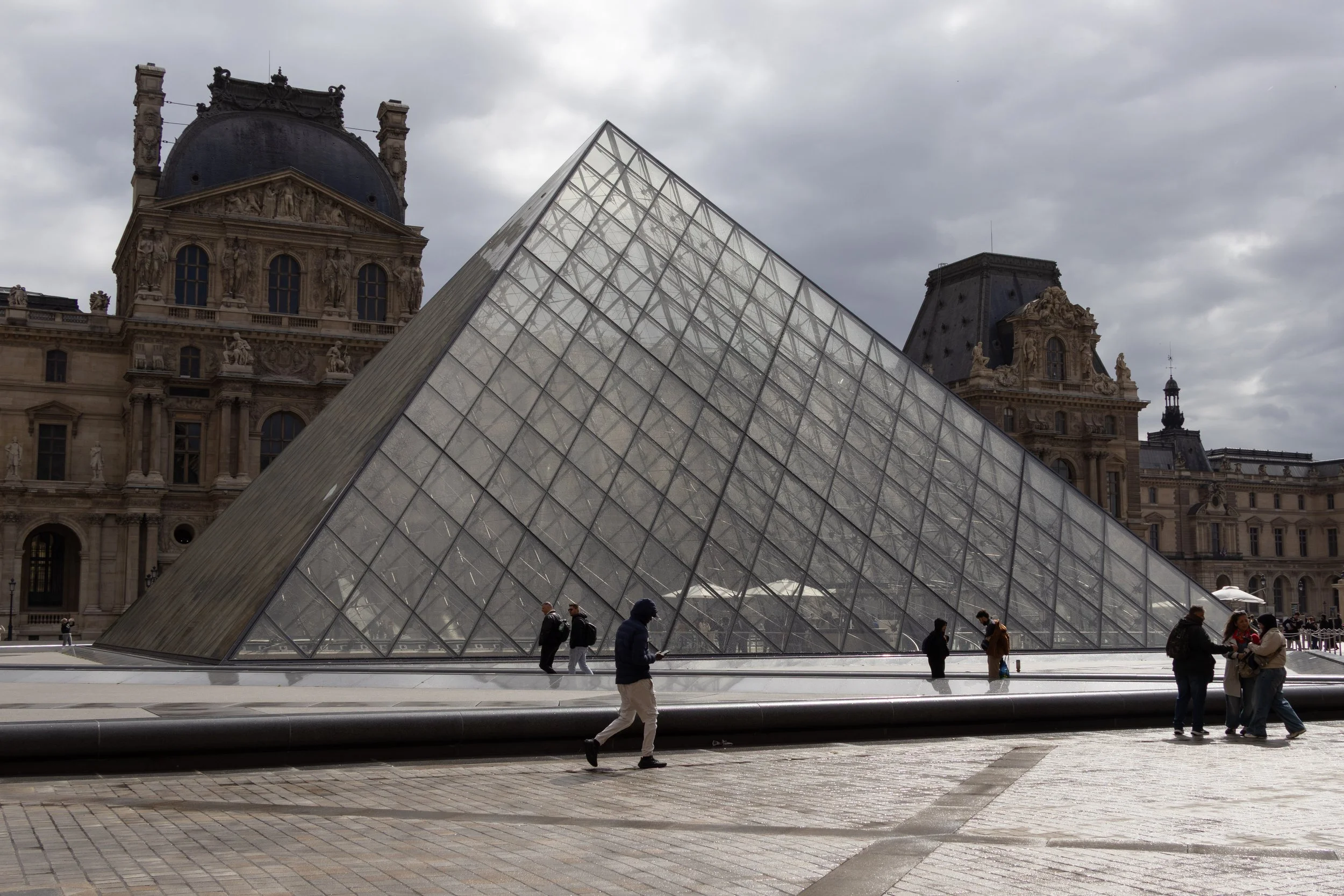 Paris, France | The Louvre Pyramid stands at the entrance to the Louvre Museum. 