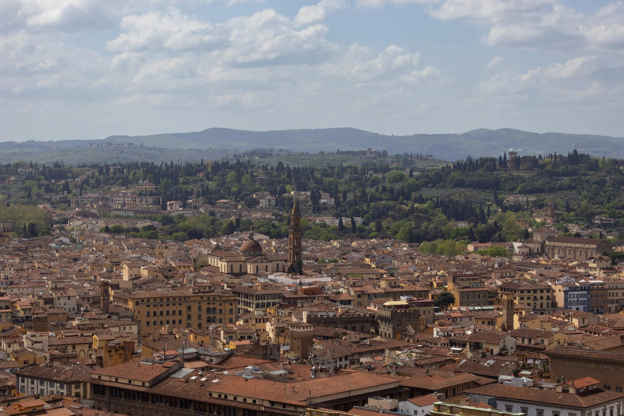 Florence, Italy | Panoramic view of the historic city and surrounding Tuscan hills. 
