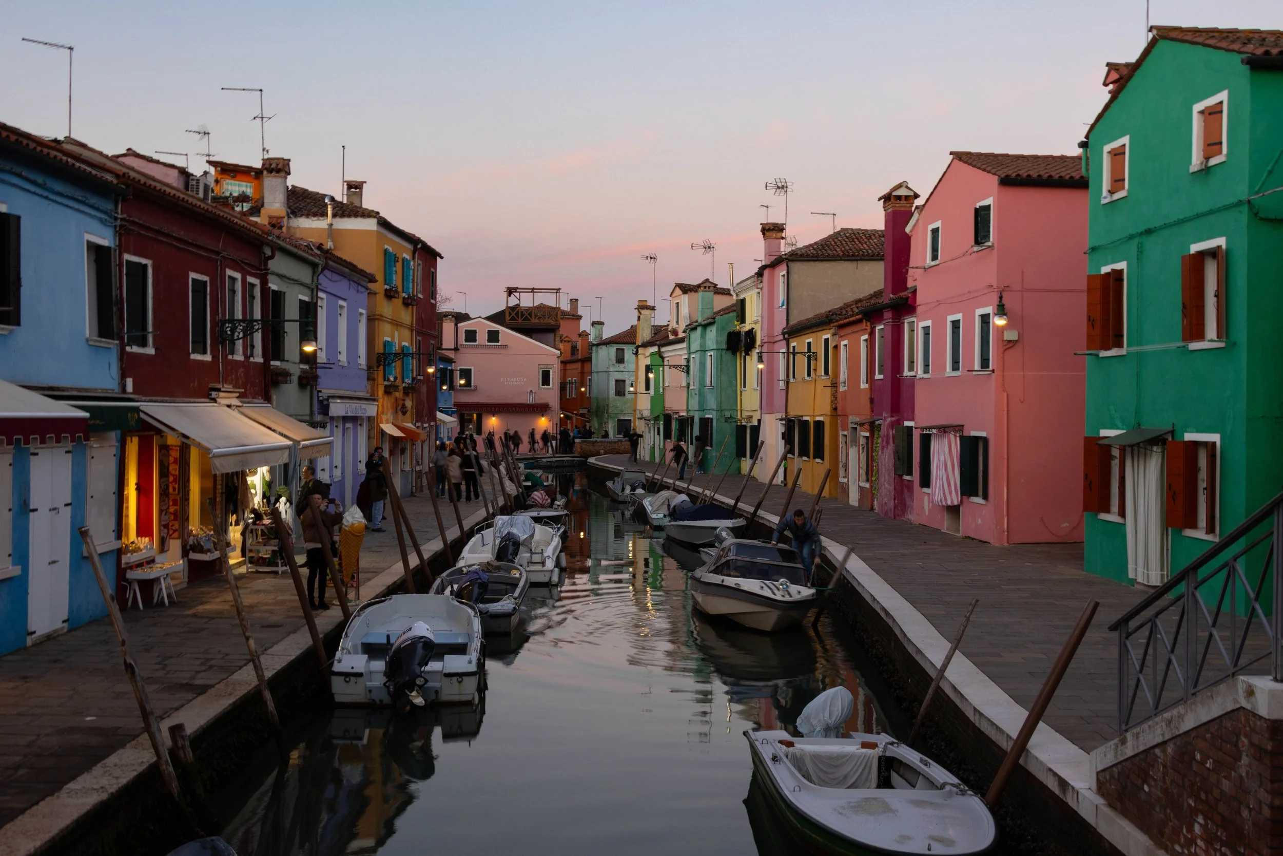 Burano Island, Italy | Colorful homes line a canal on Burano Island. 