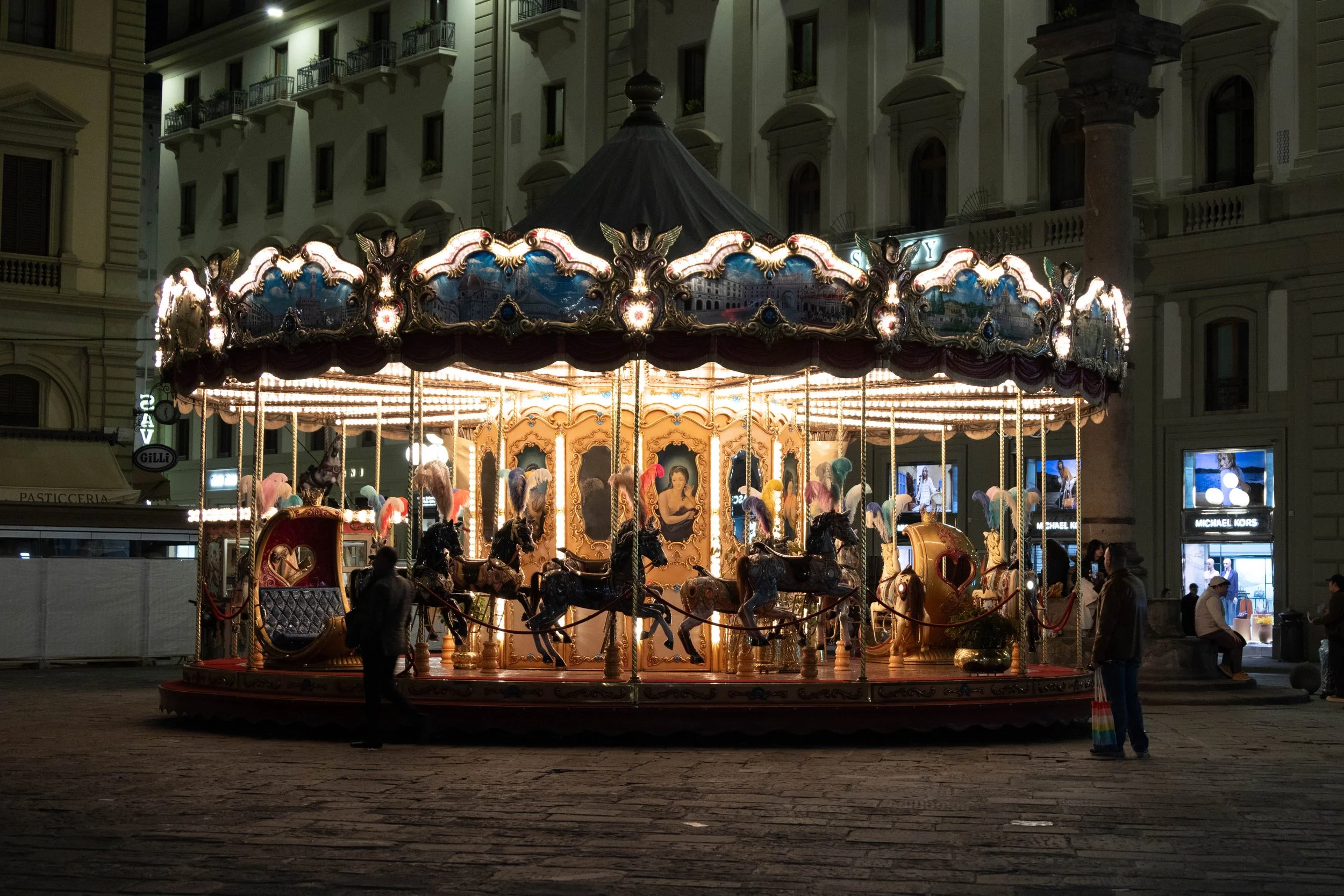 Florence, Italy | Carousel in Piazza Della Repubblica at night.